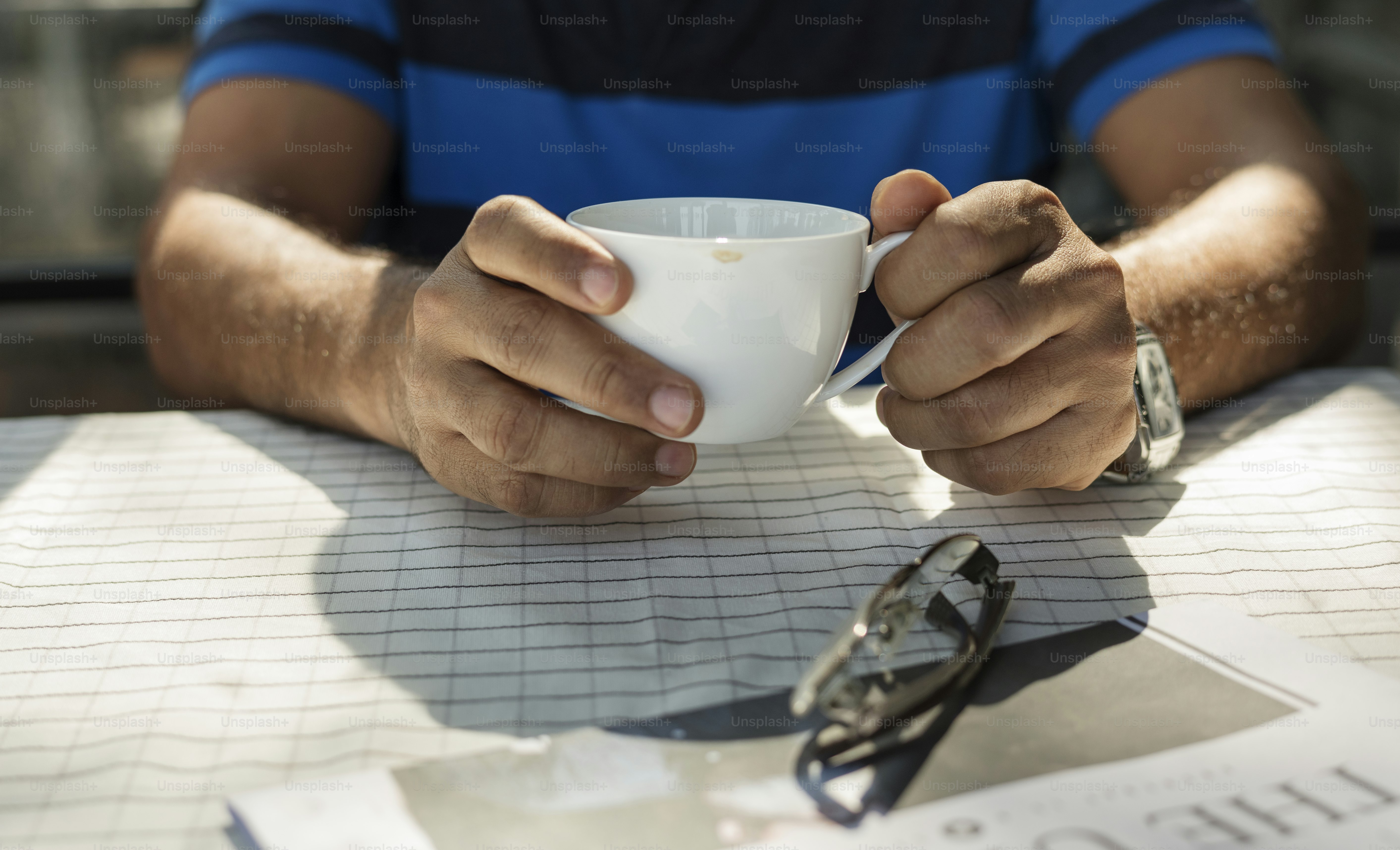 Man holding a cup of coffee