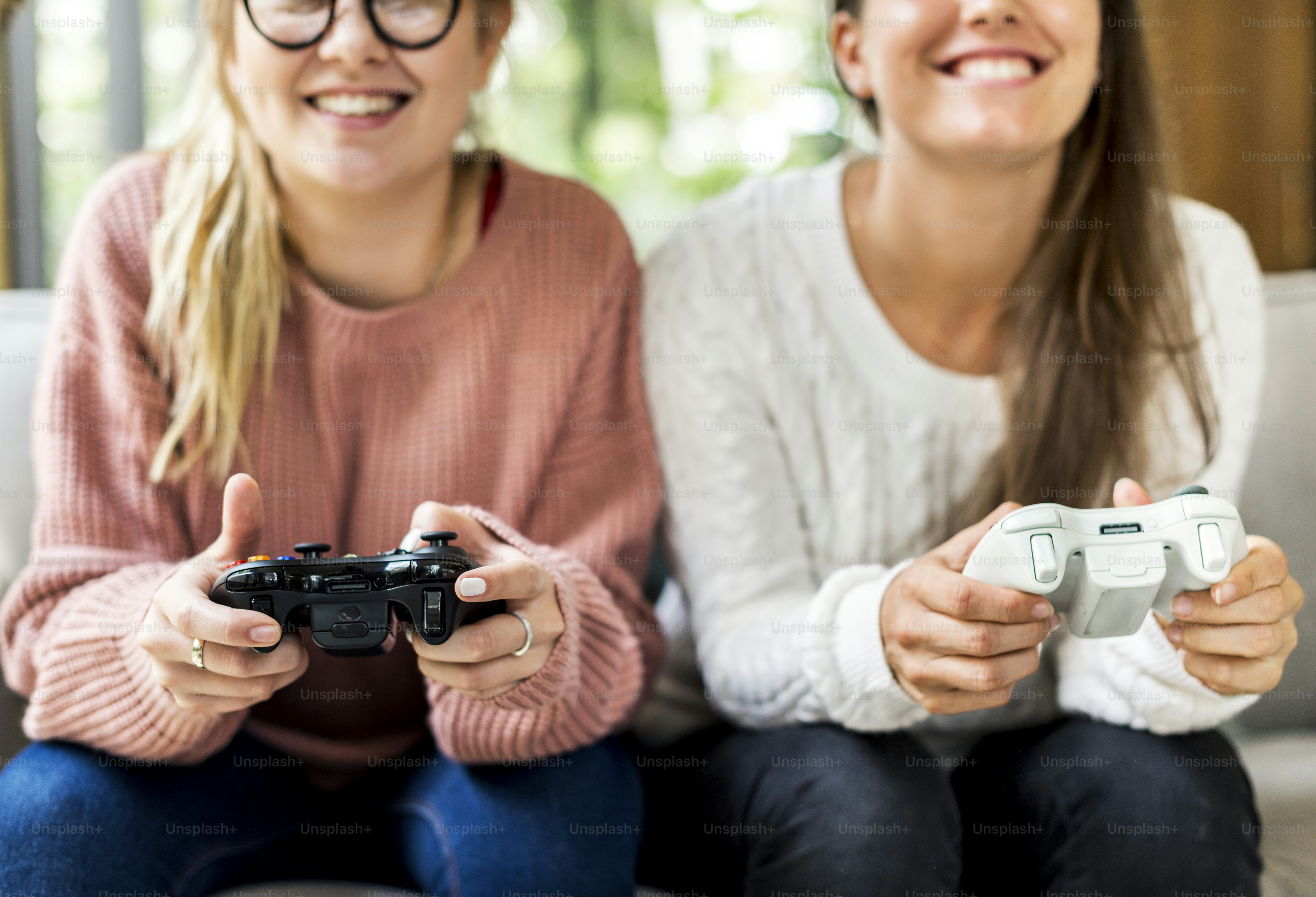 Women playing video game together