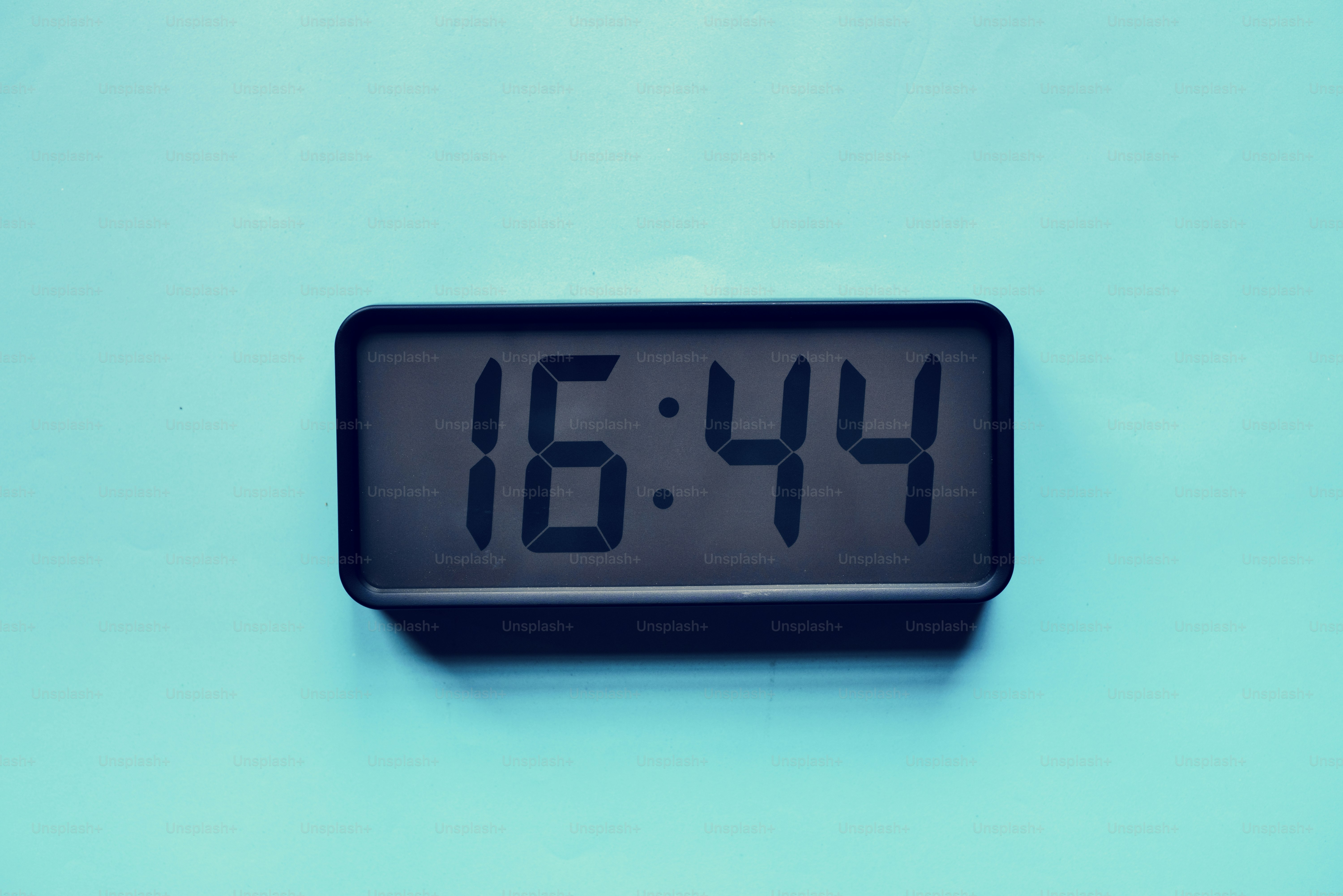 Digital clock on blue background