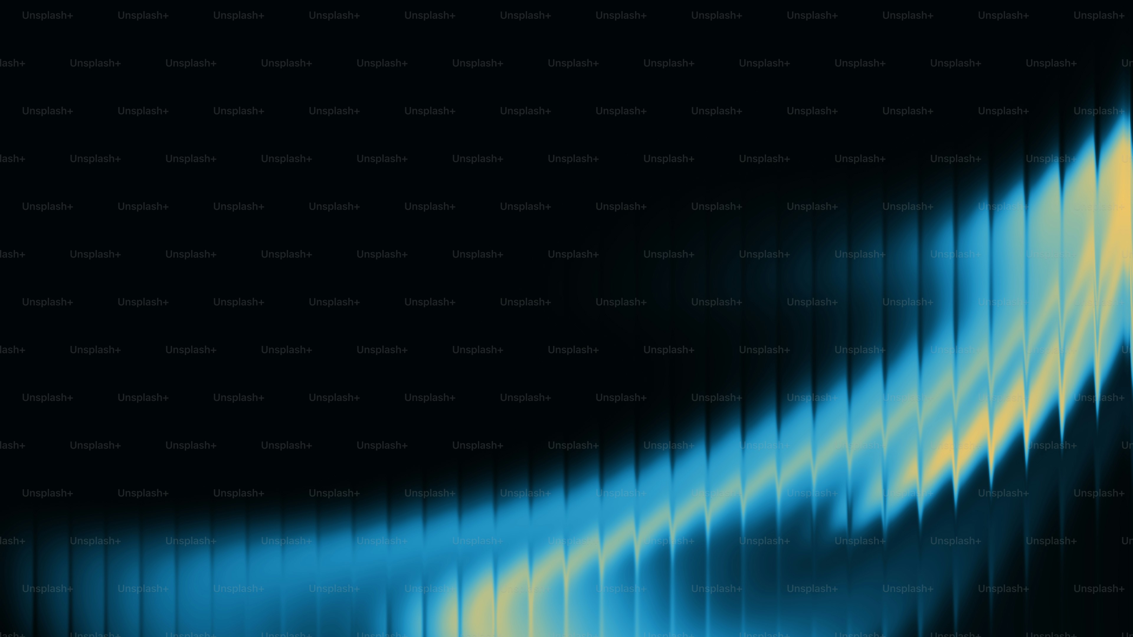 Des traînées de lumière abstraites bleues et jaunes sur fond noir