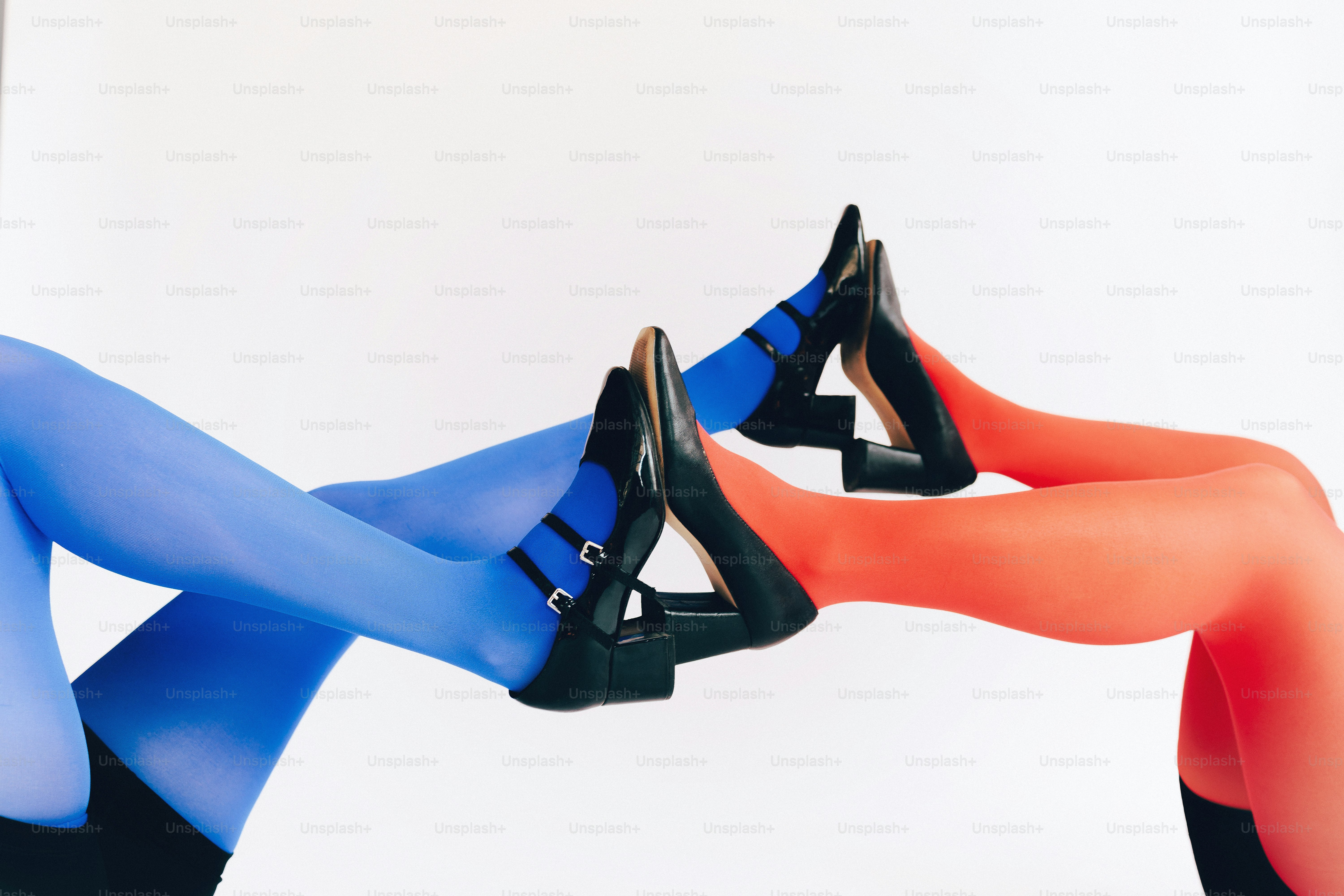 Legs in blue and red tights with black heels. photo – Tights Image on ...