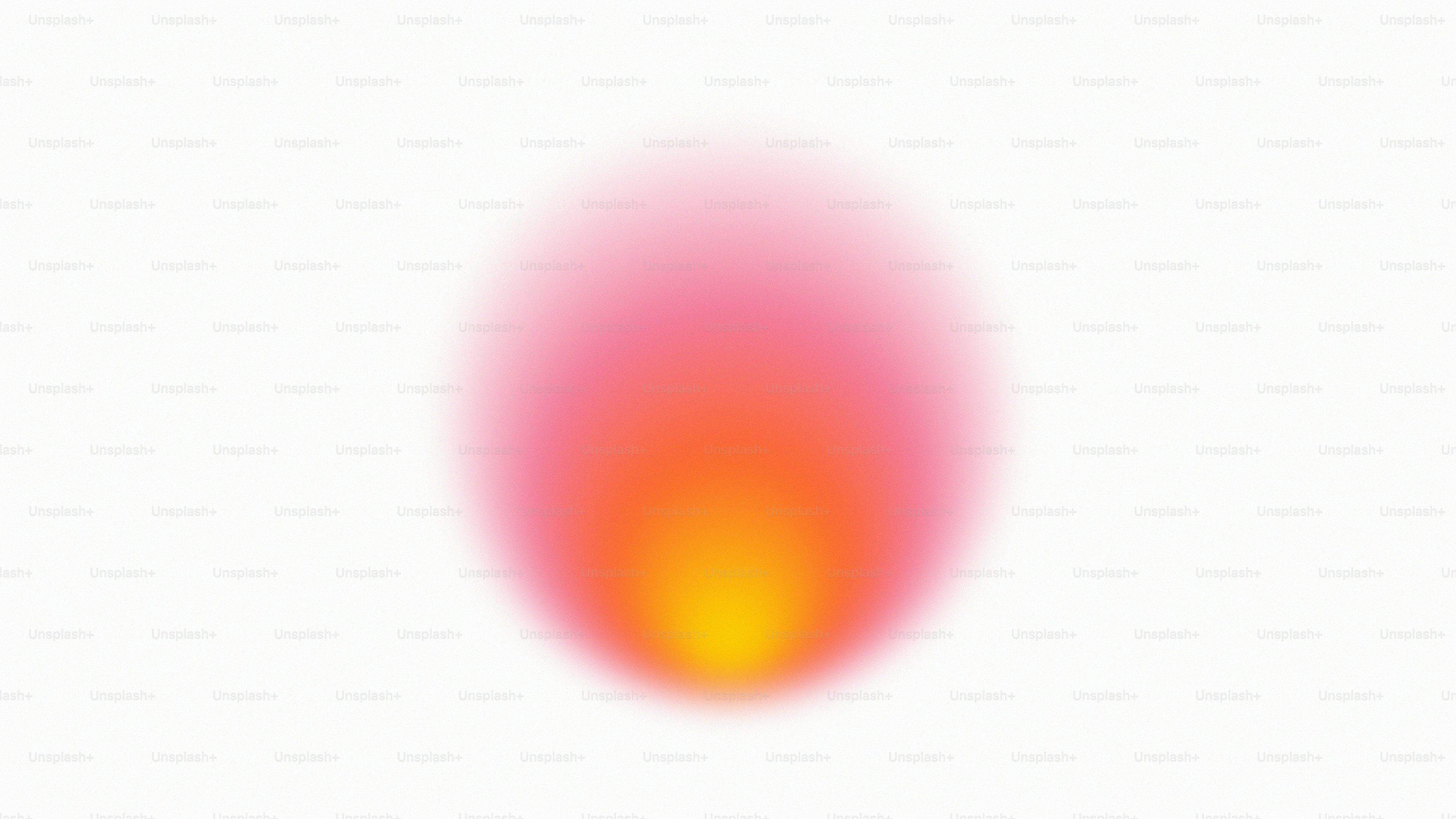 Uma chama suave e borrada com tons amarelos e rosados