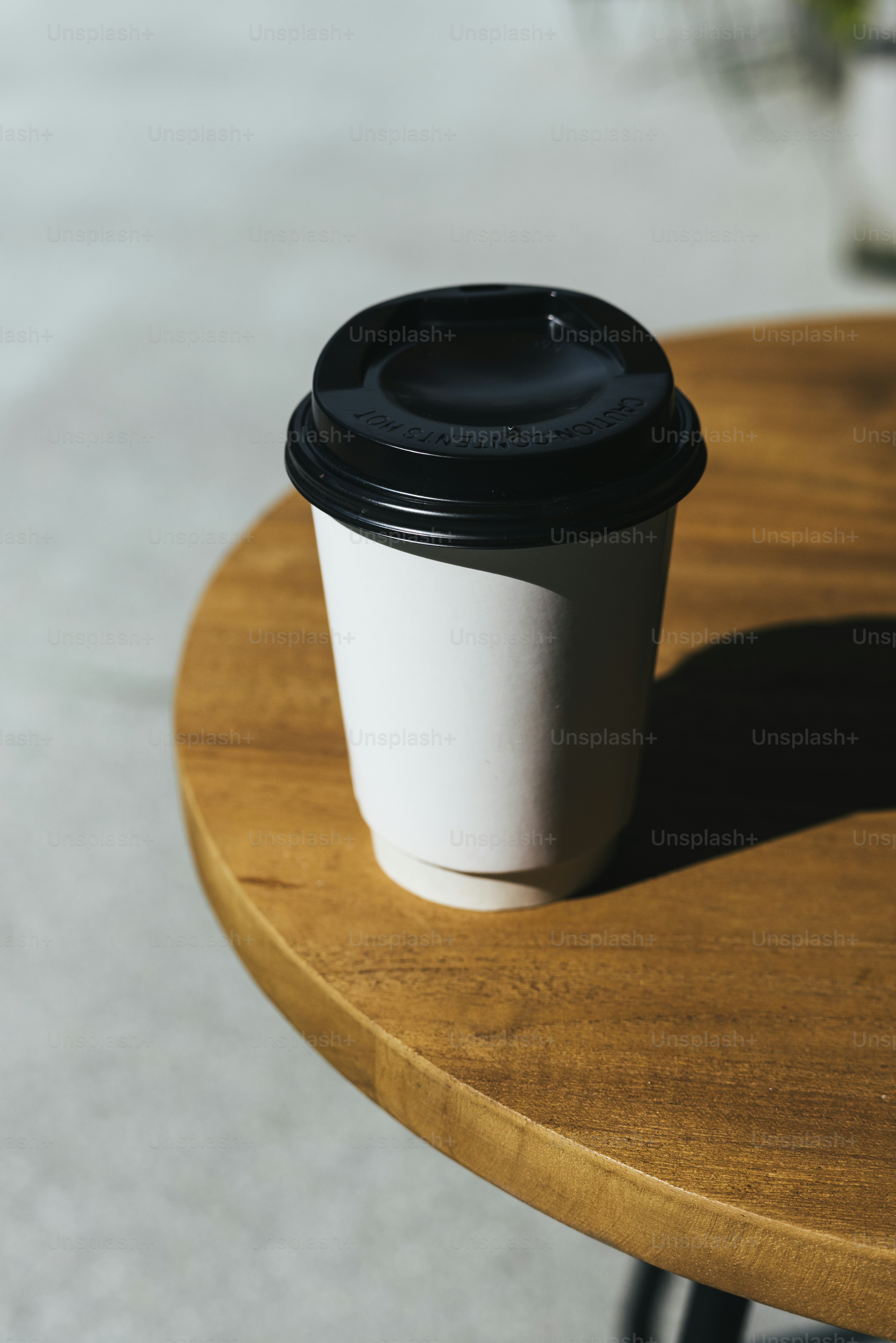 Mockup of a disposable cup of coffee