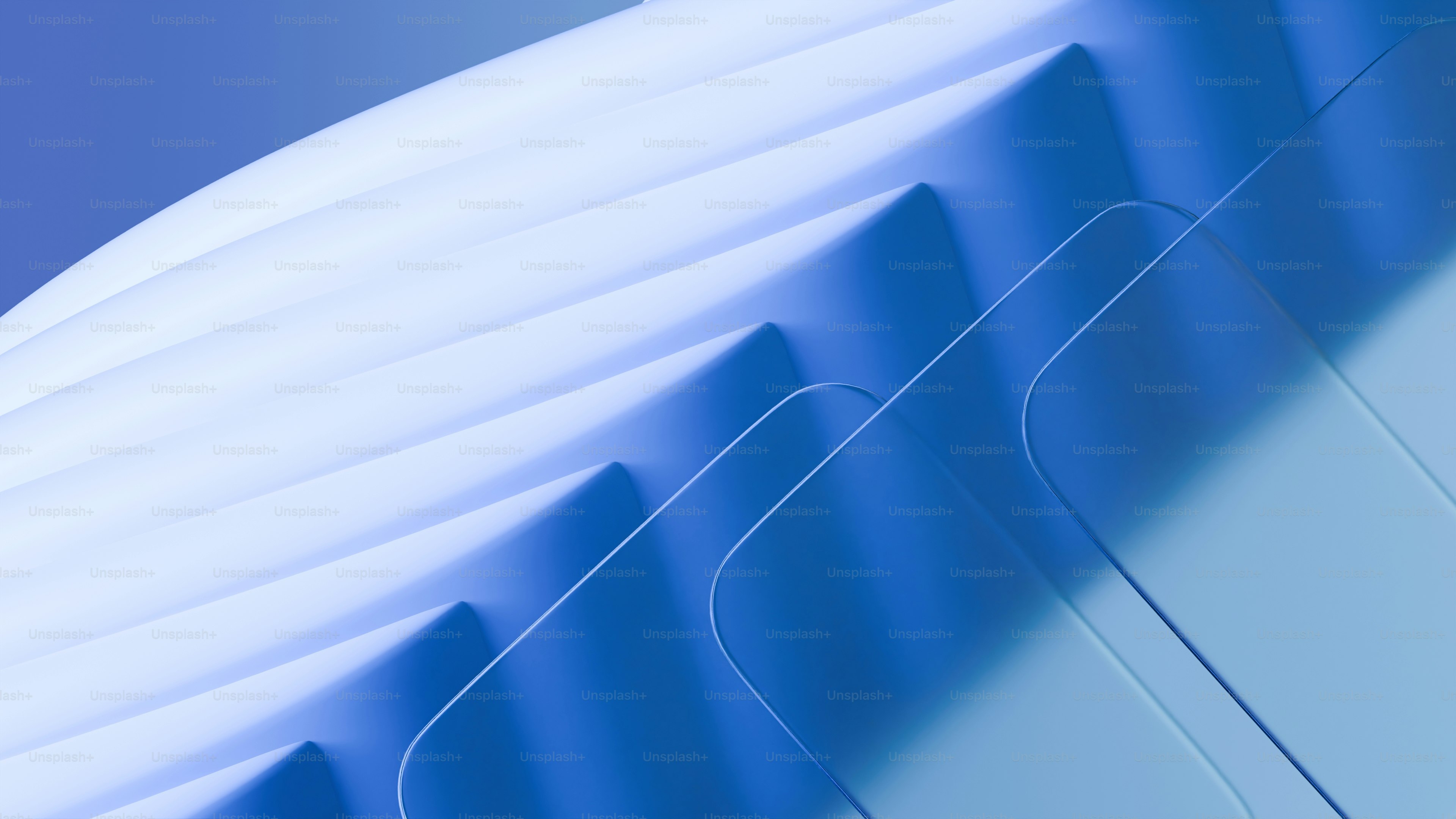 Abstract blue and white layered shapes with soft lighting