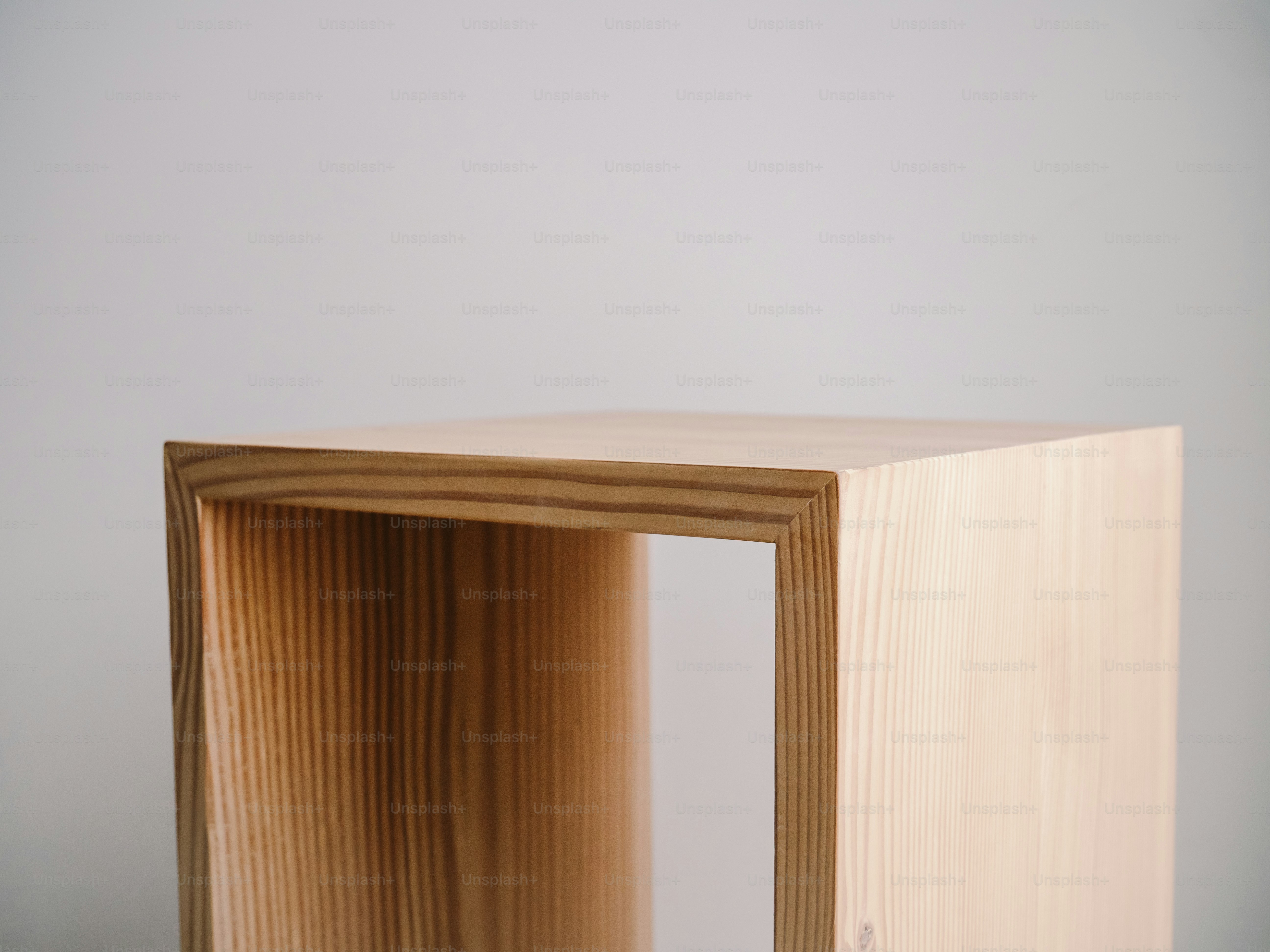 Light wood cube with an opening in the center