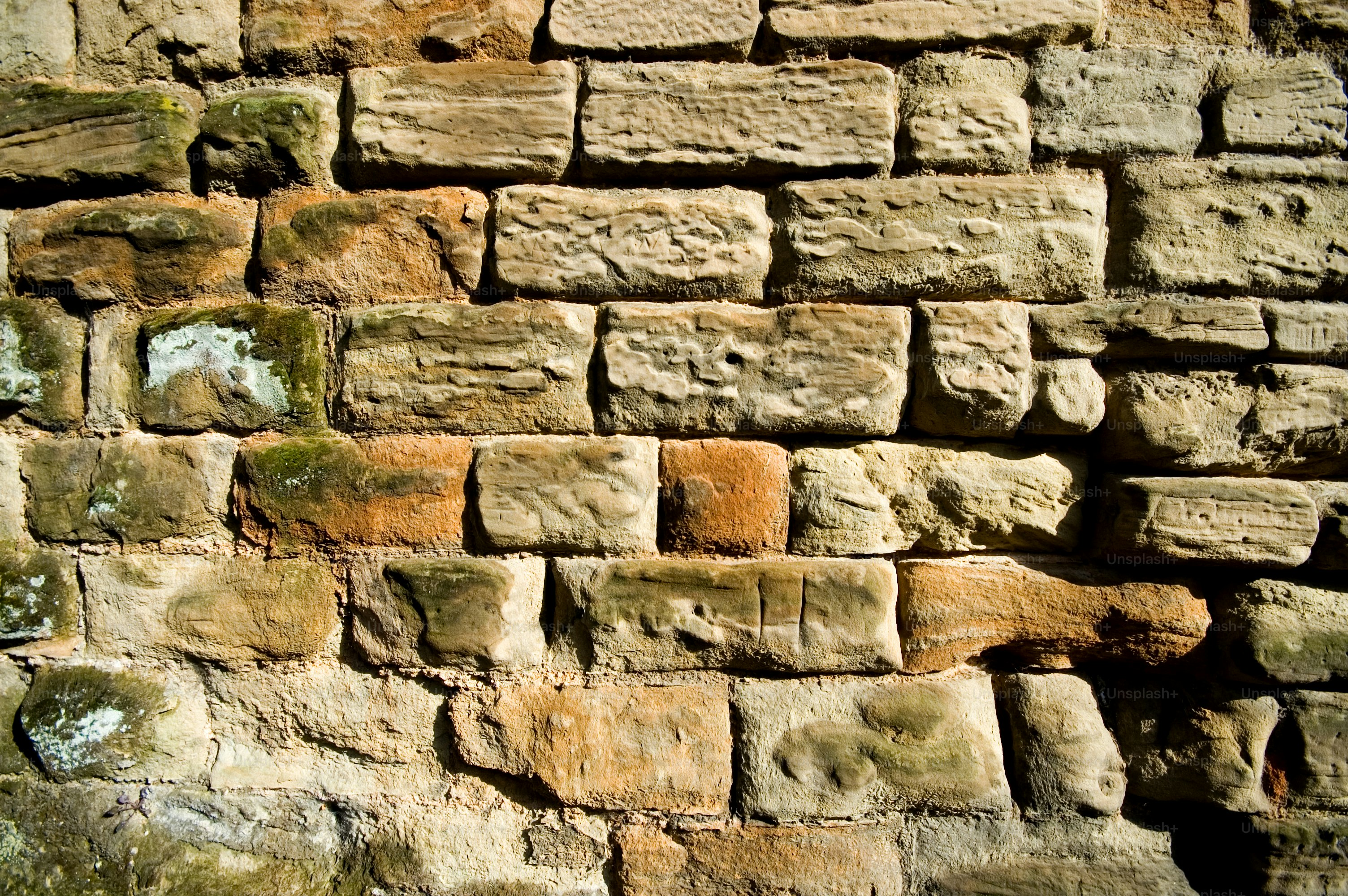 English castle stone wall in the late afternoon sun.