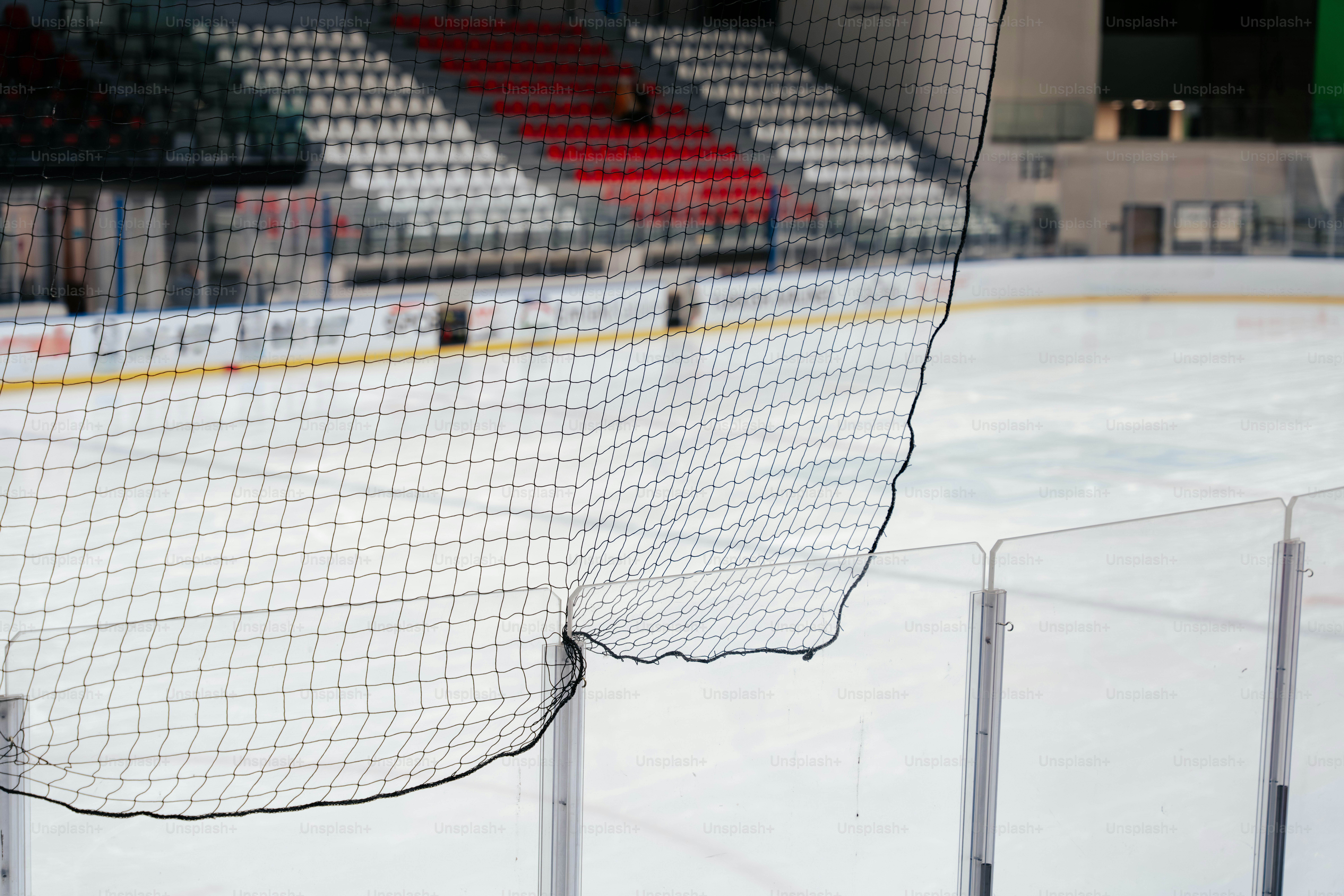 An empty ice hockey rink with a net photo – Goal Image on Unsplash