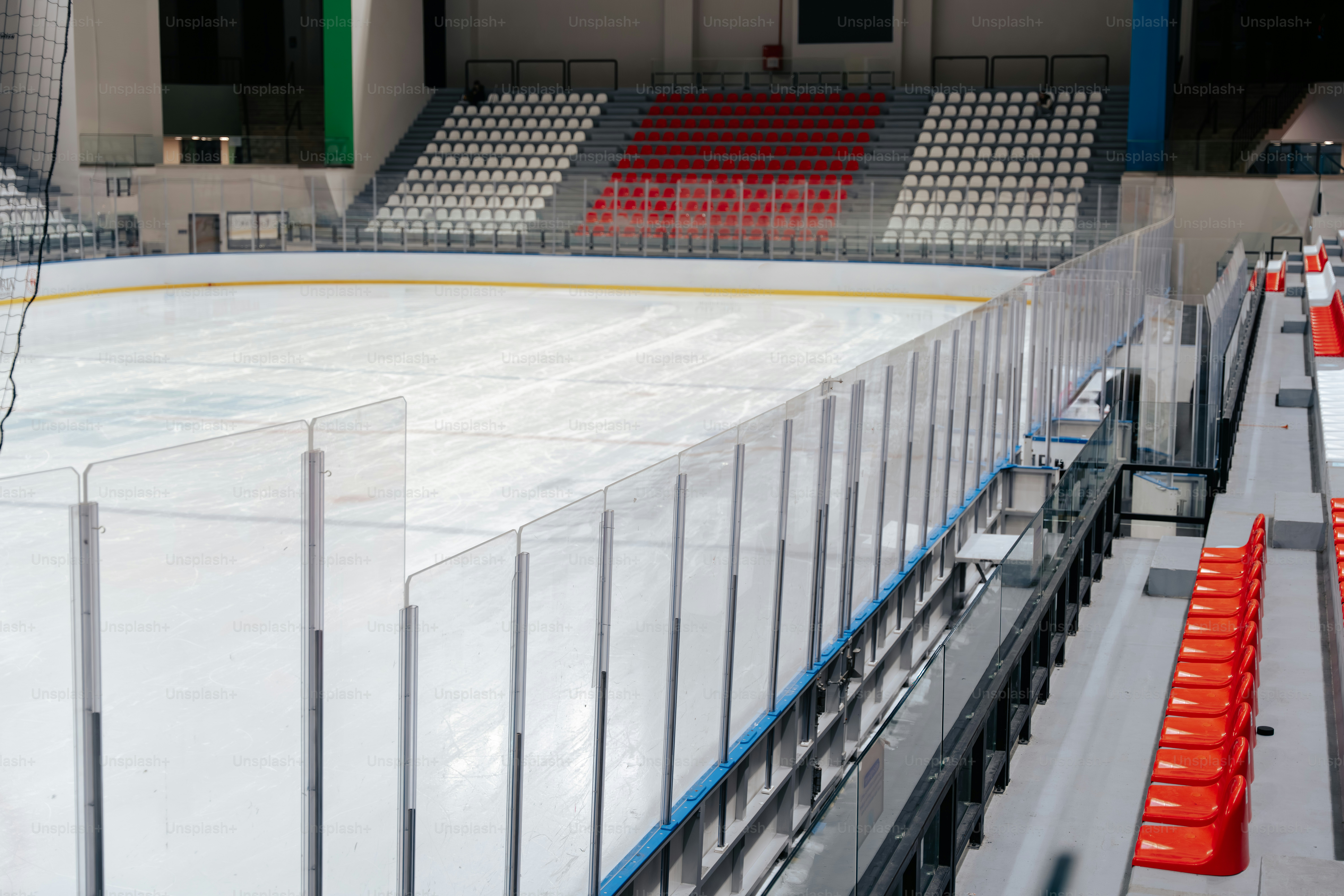 An empty ice hockey rink with a net photo – Goal Image on Unsplash