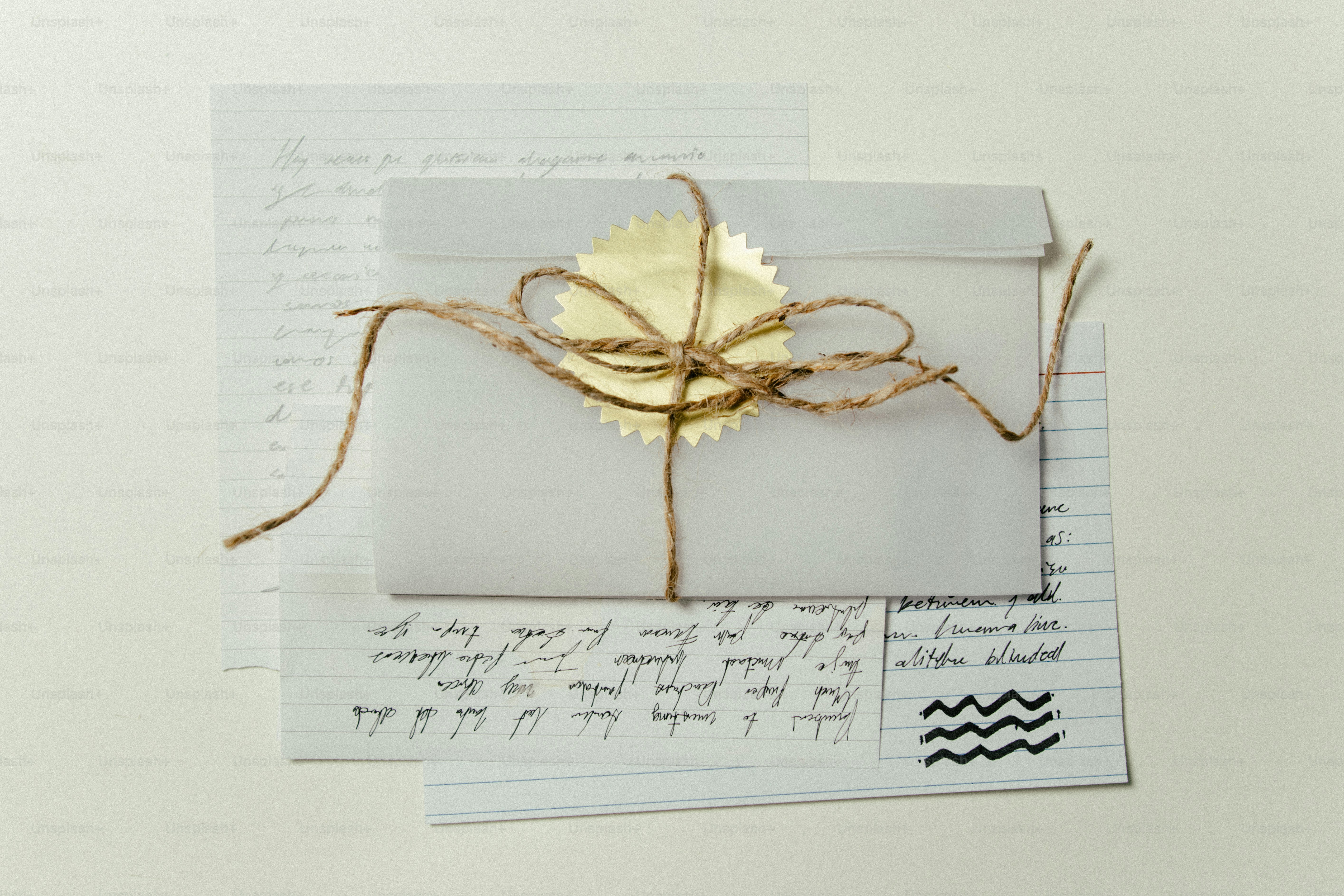 Three colorful envelopes inside a white envelope photo – Paper Image on ...