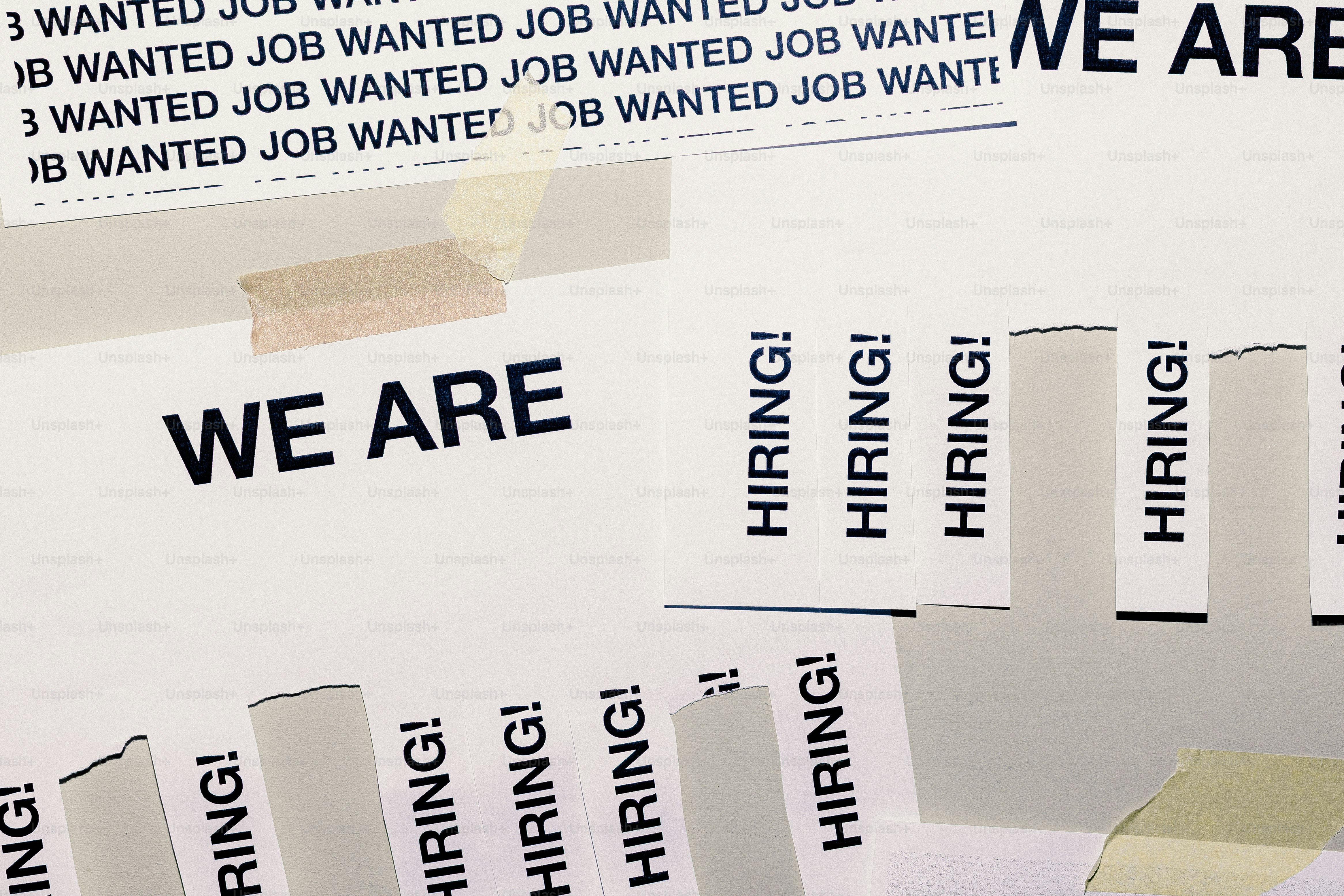 We are hiring signs and wanted job notices.