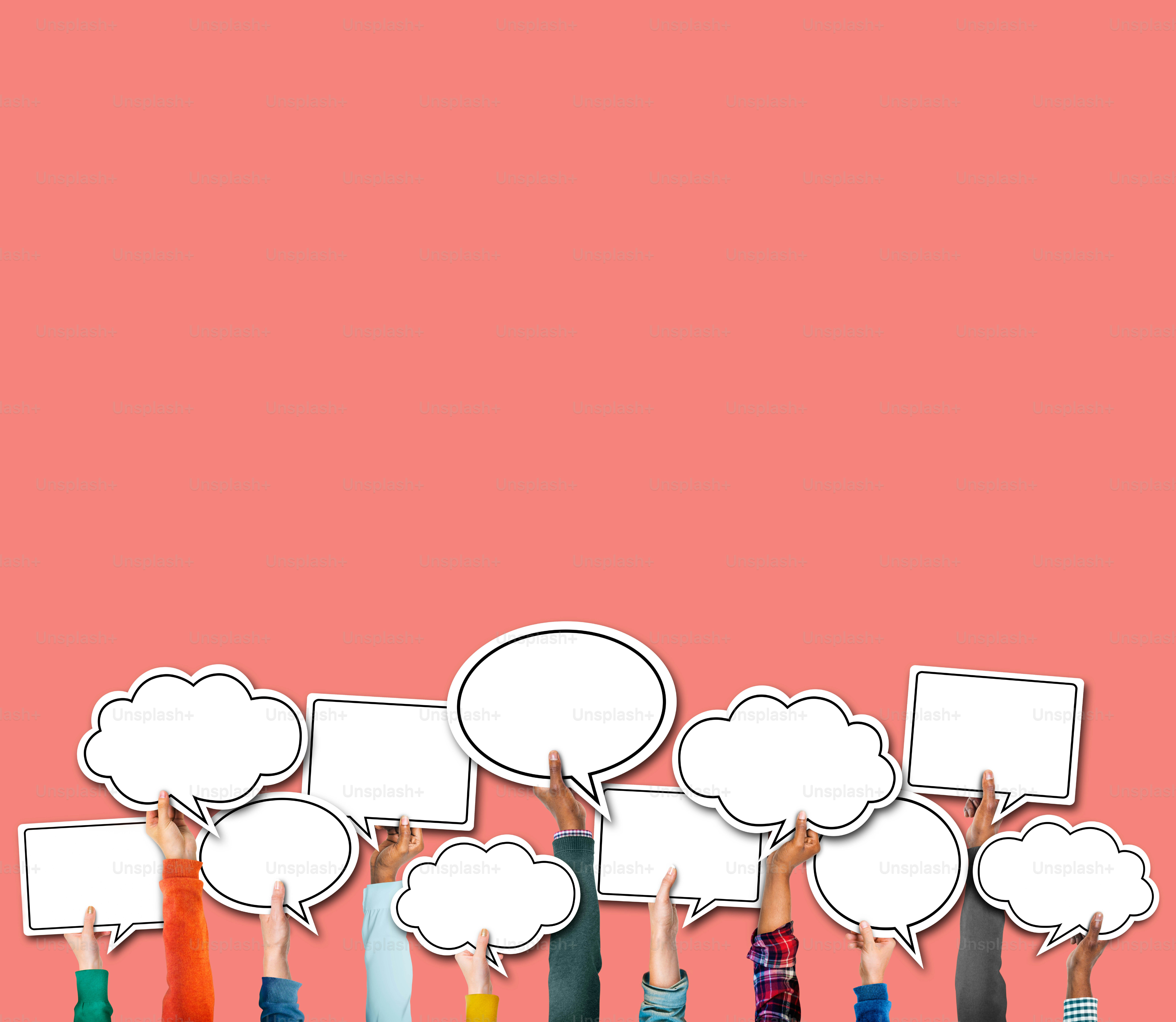 Group of Hands Holding Speech Bubble Concept