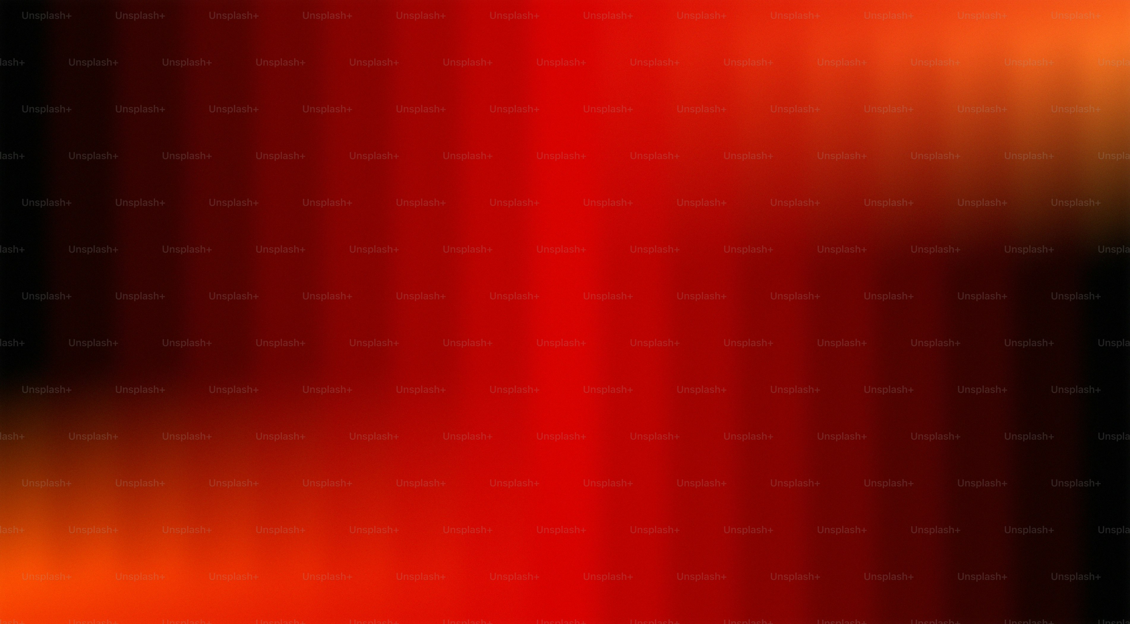 검정과 빨강 그라데이션 배경에 주황색 포인트가 있습니다