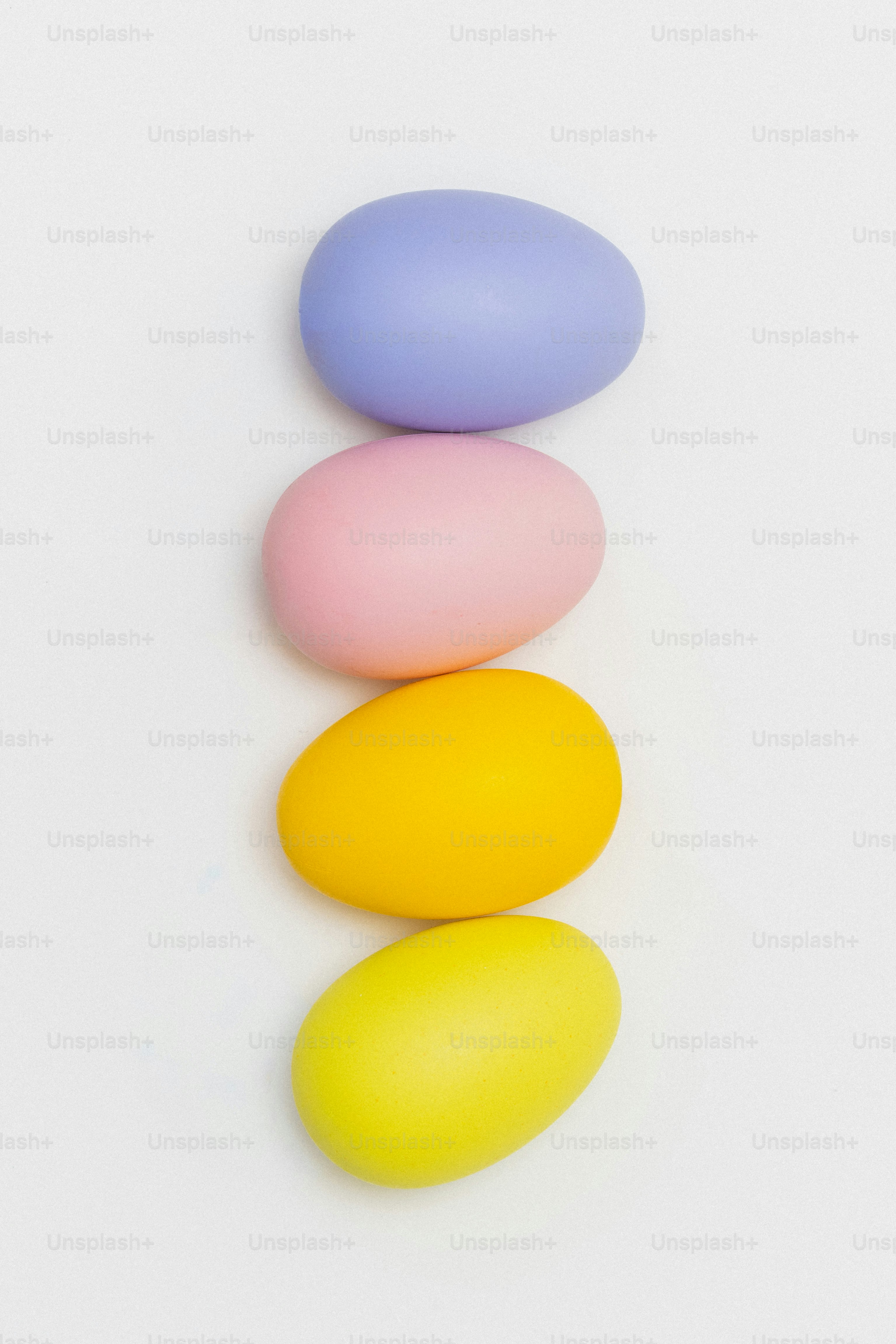 Several striped oval objects on a white background. photo – Minimalist ...