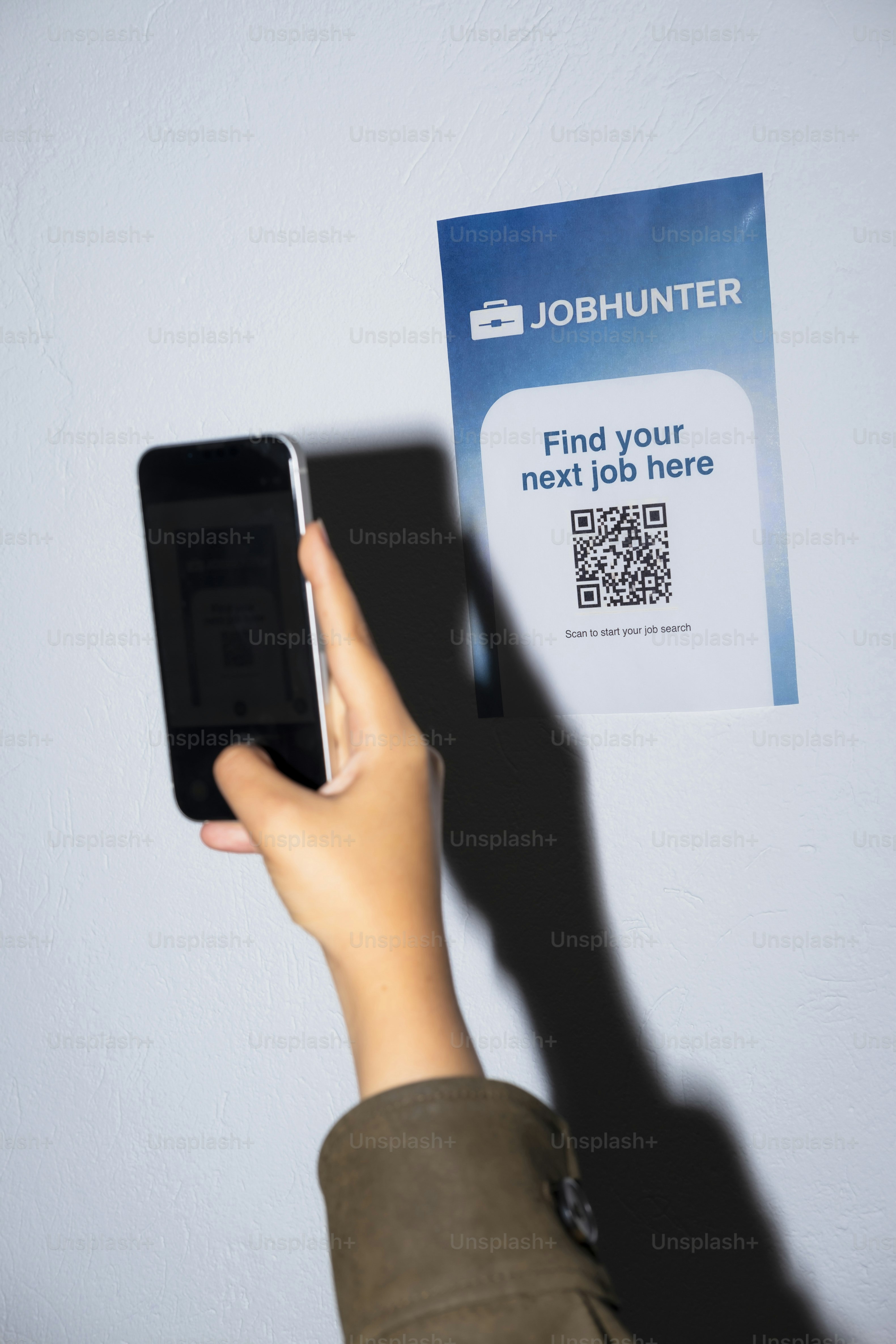 Hand scans qr code on job search poster photo – Technology Image on ...