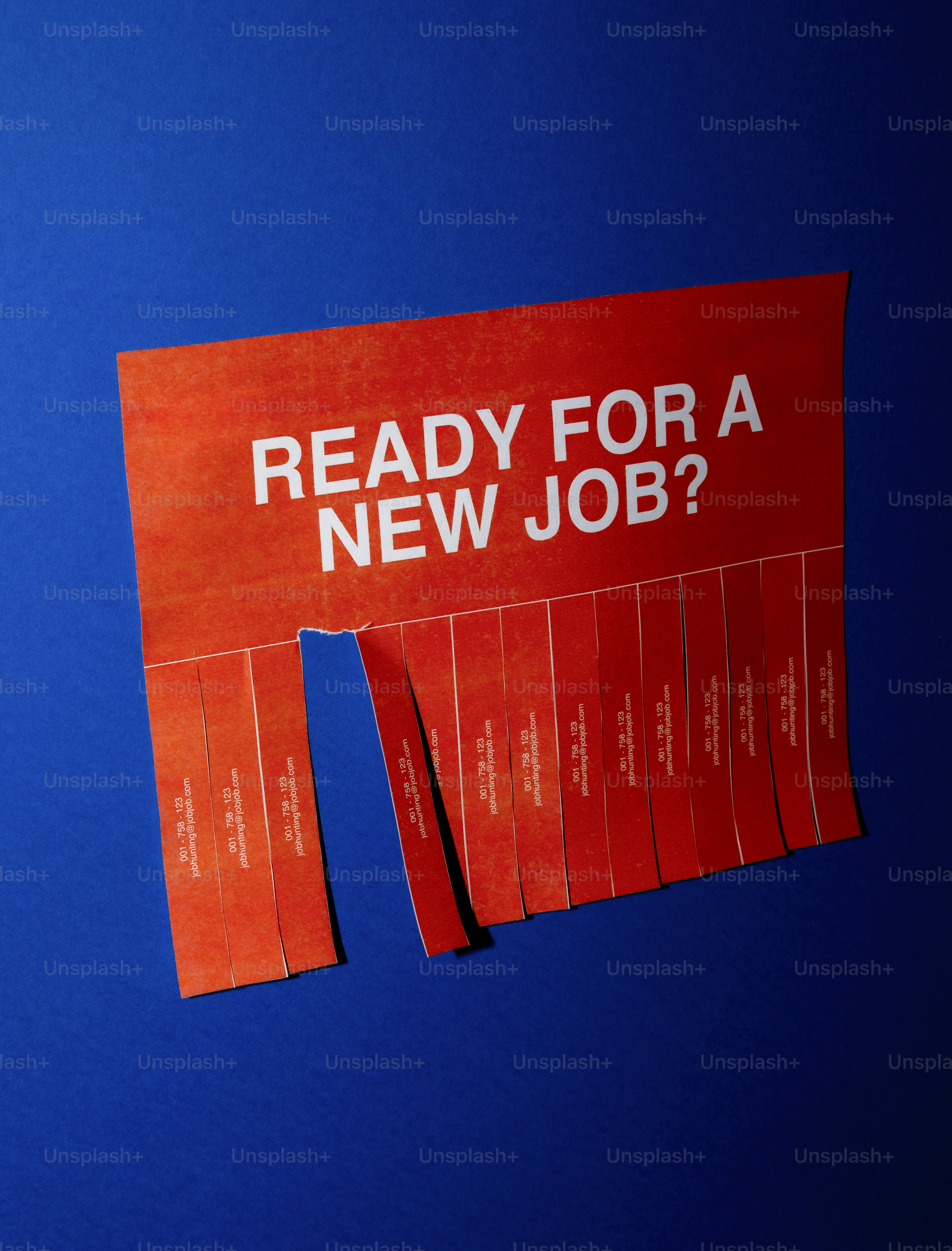 Orange tear-off flyer asking "ready for a new job?"