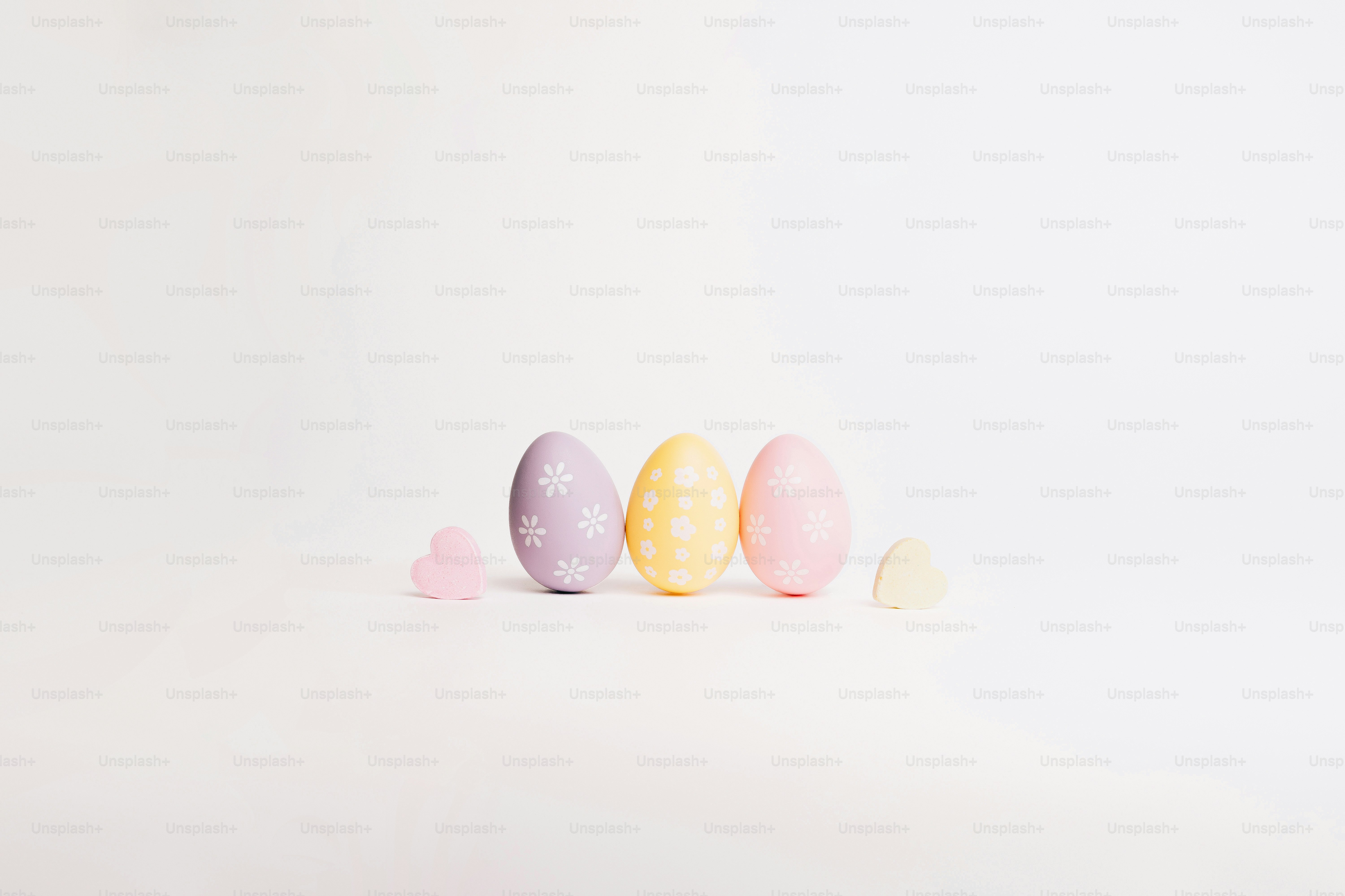 Three pastel easter eggs with small candies