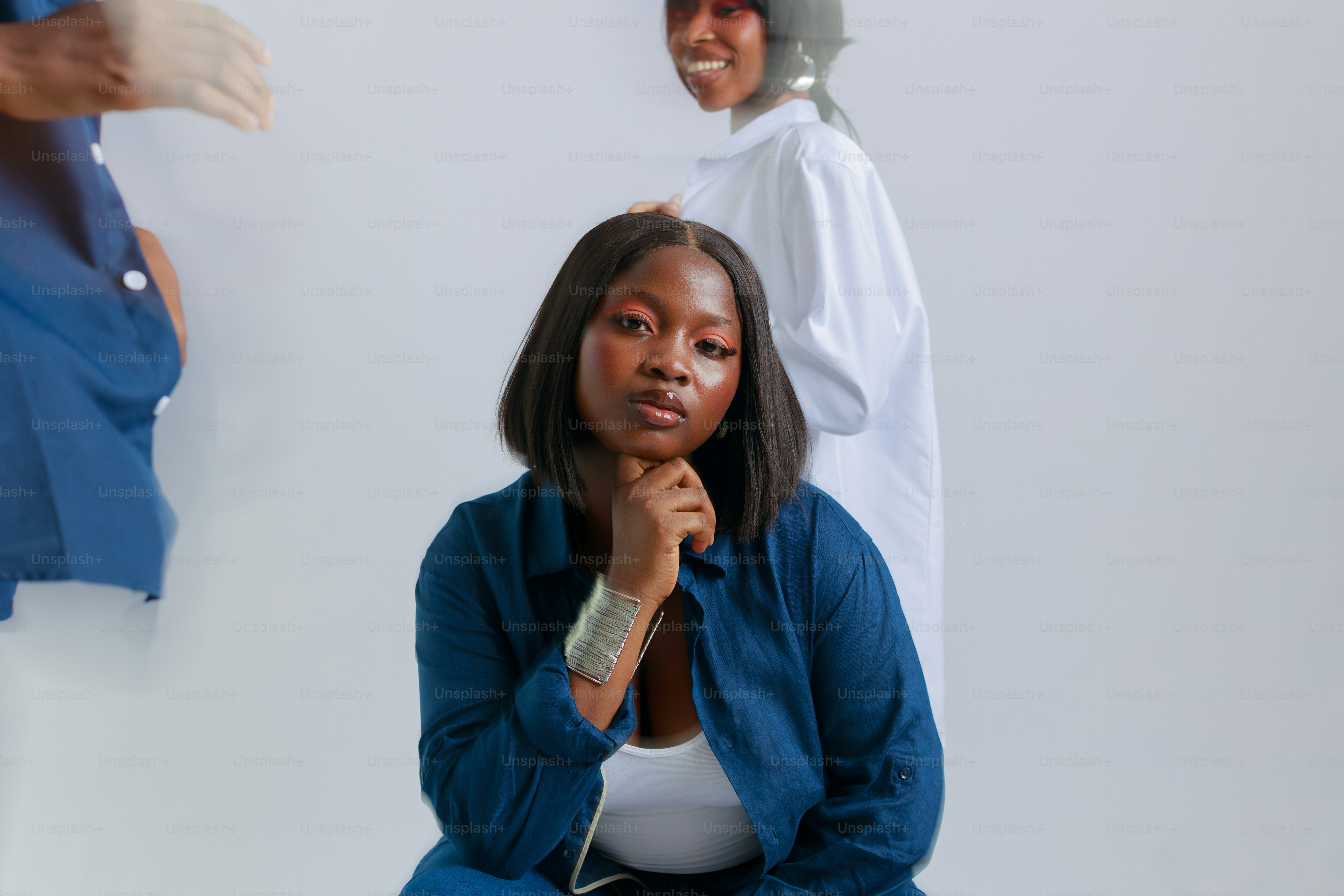 Young black woman with hand on chin