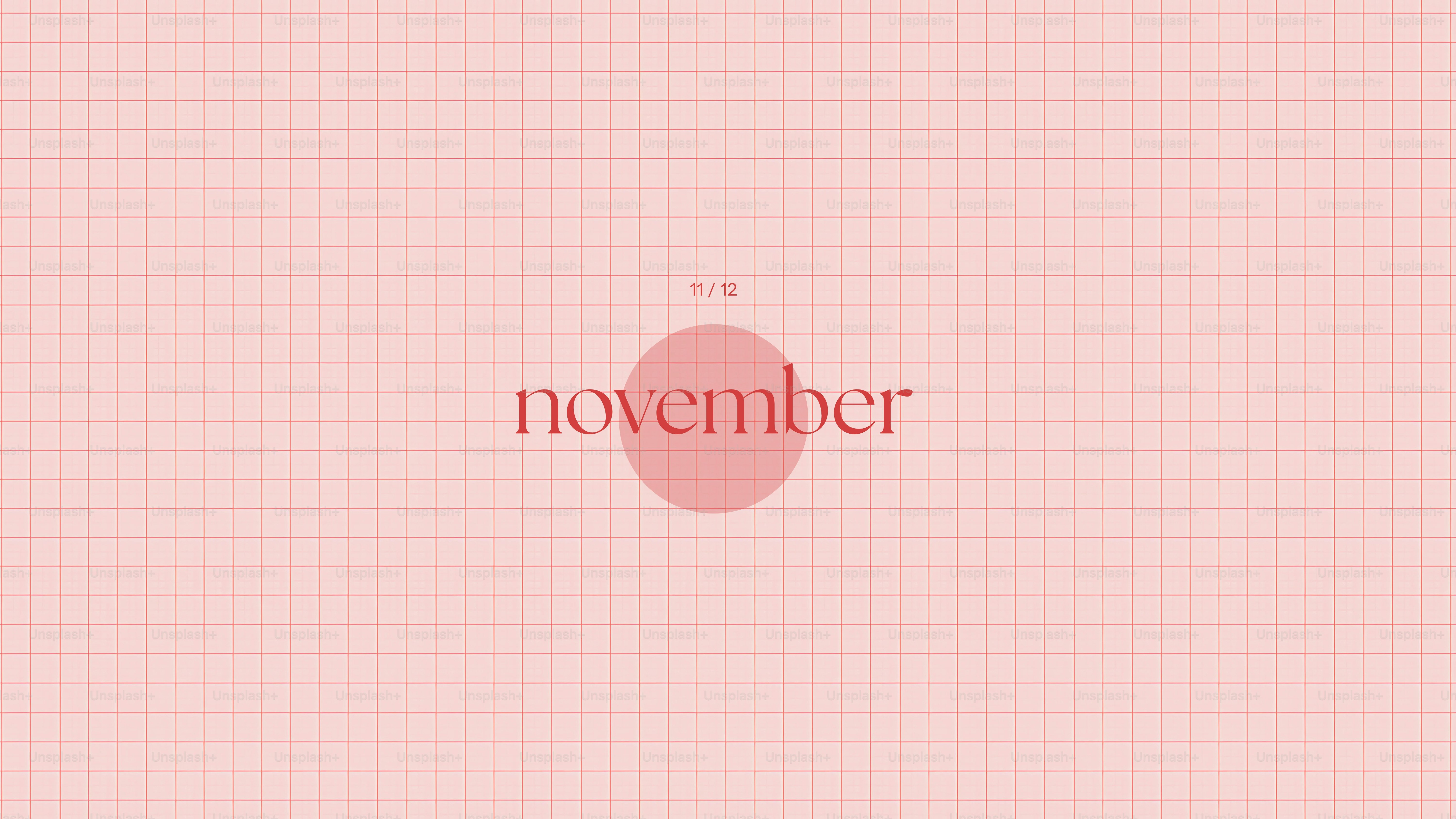 A palavra novembro sobre um fundo de grade rosa.
