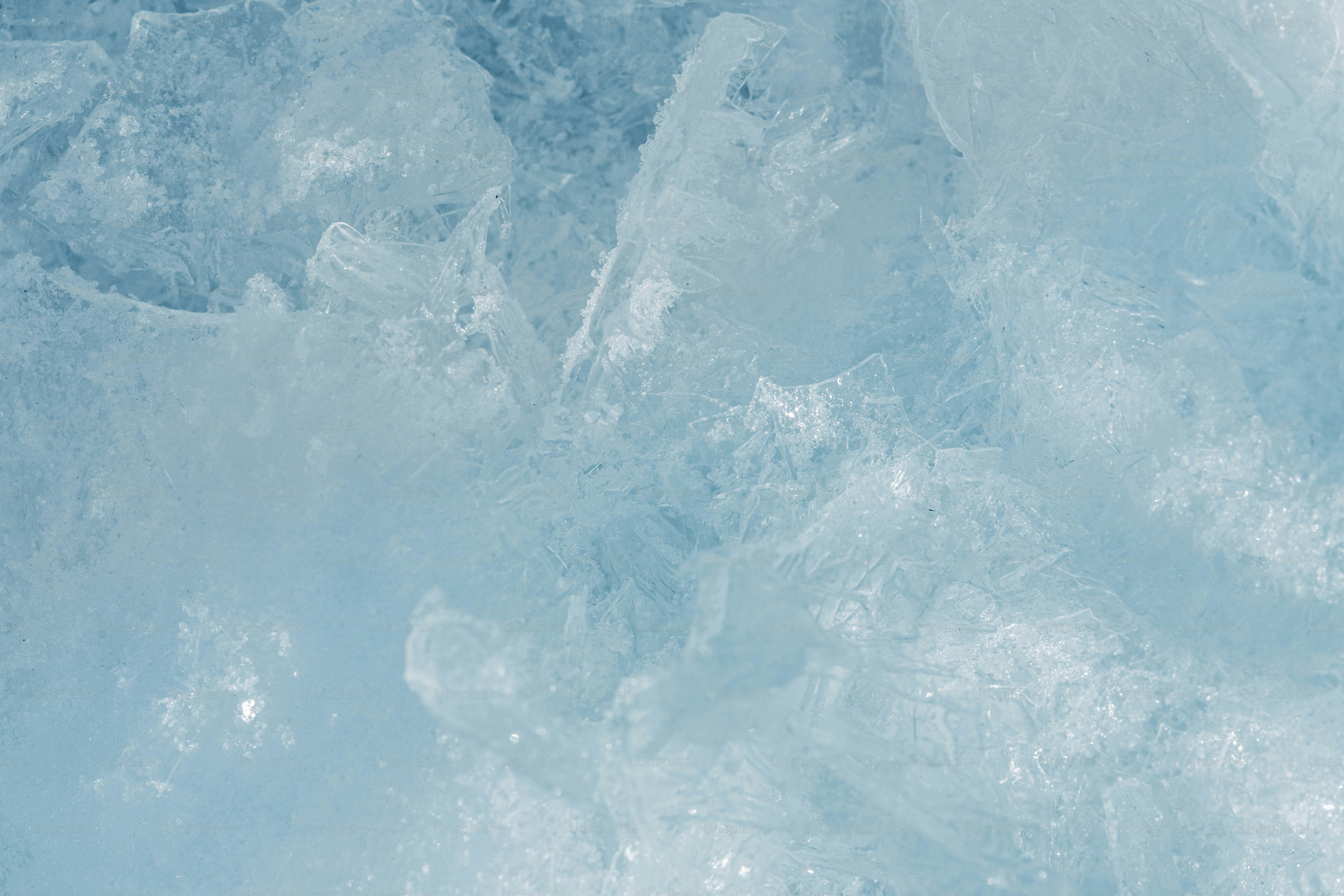 Close-up of textured ice with light blue hues photo – Abstract Image on ...