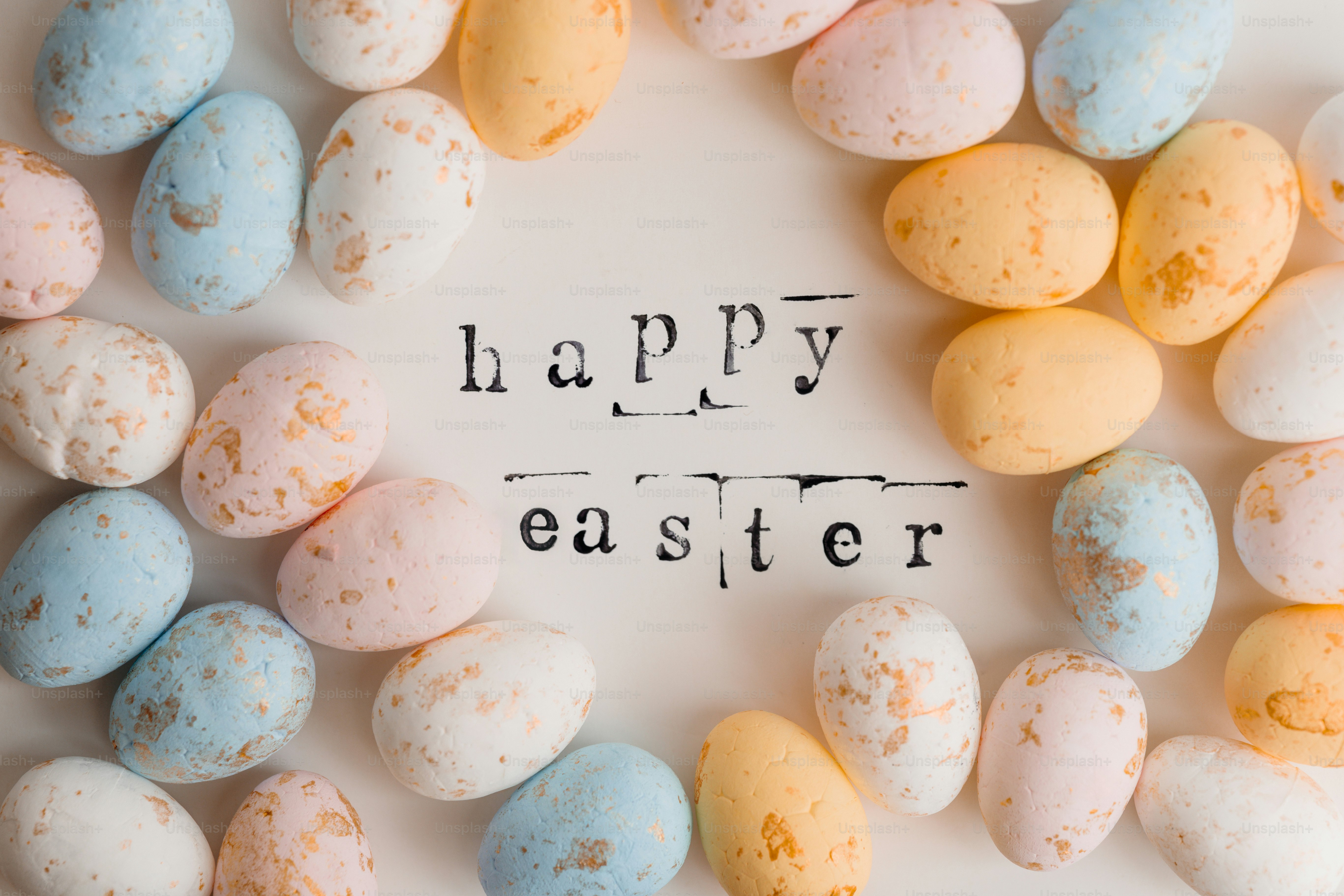 Pastel easter eggs arranged around 