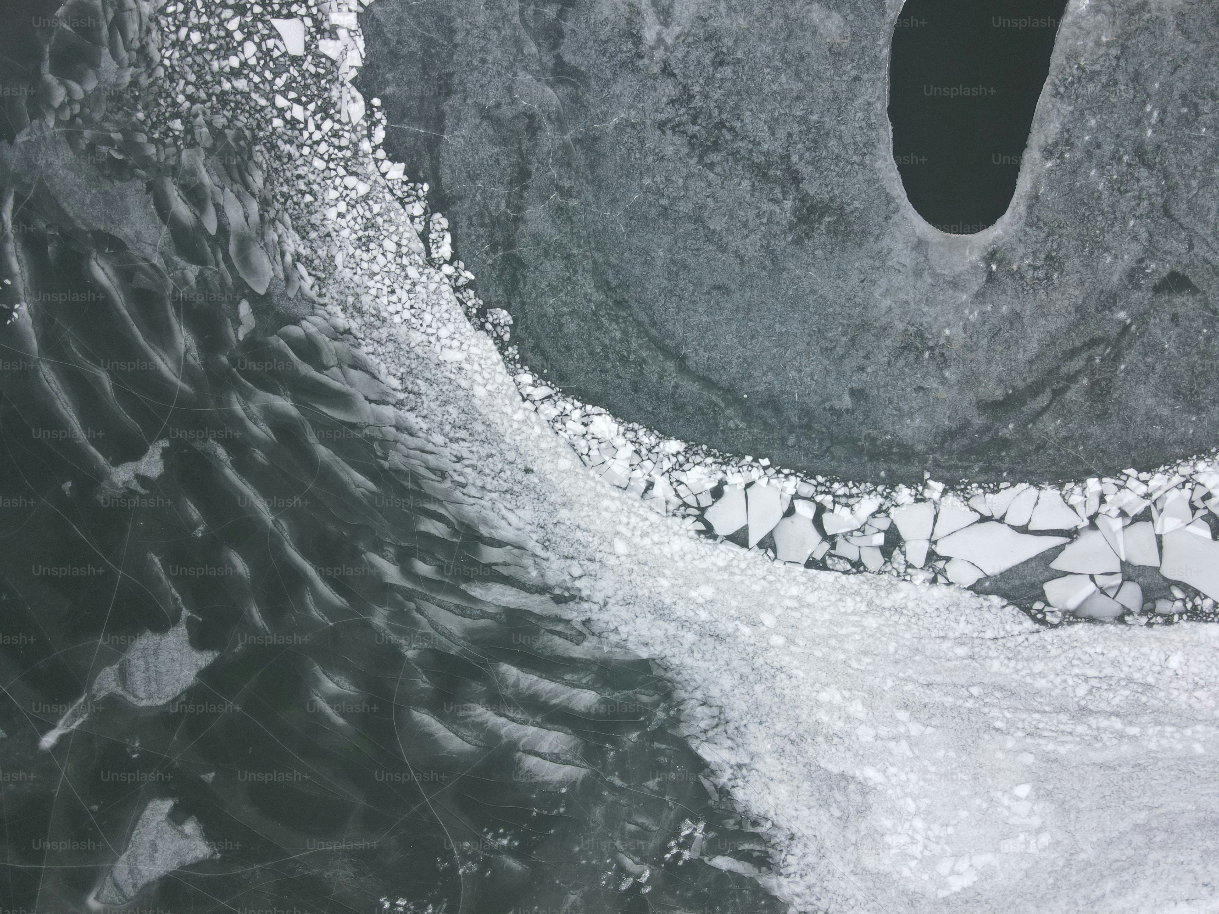 Aerial view of ice floes on dark water