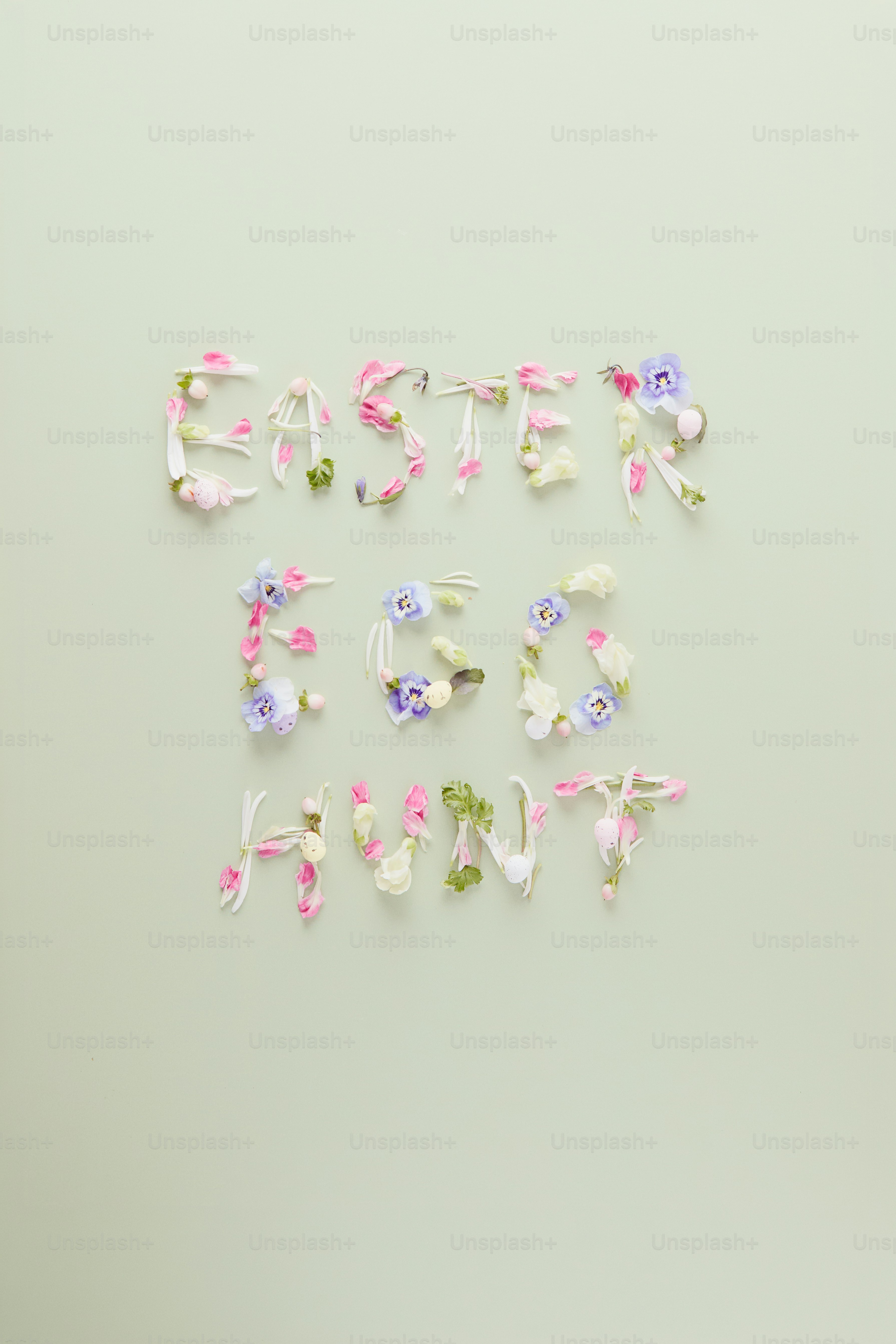 Easter egg hunt text made of flowers