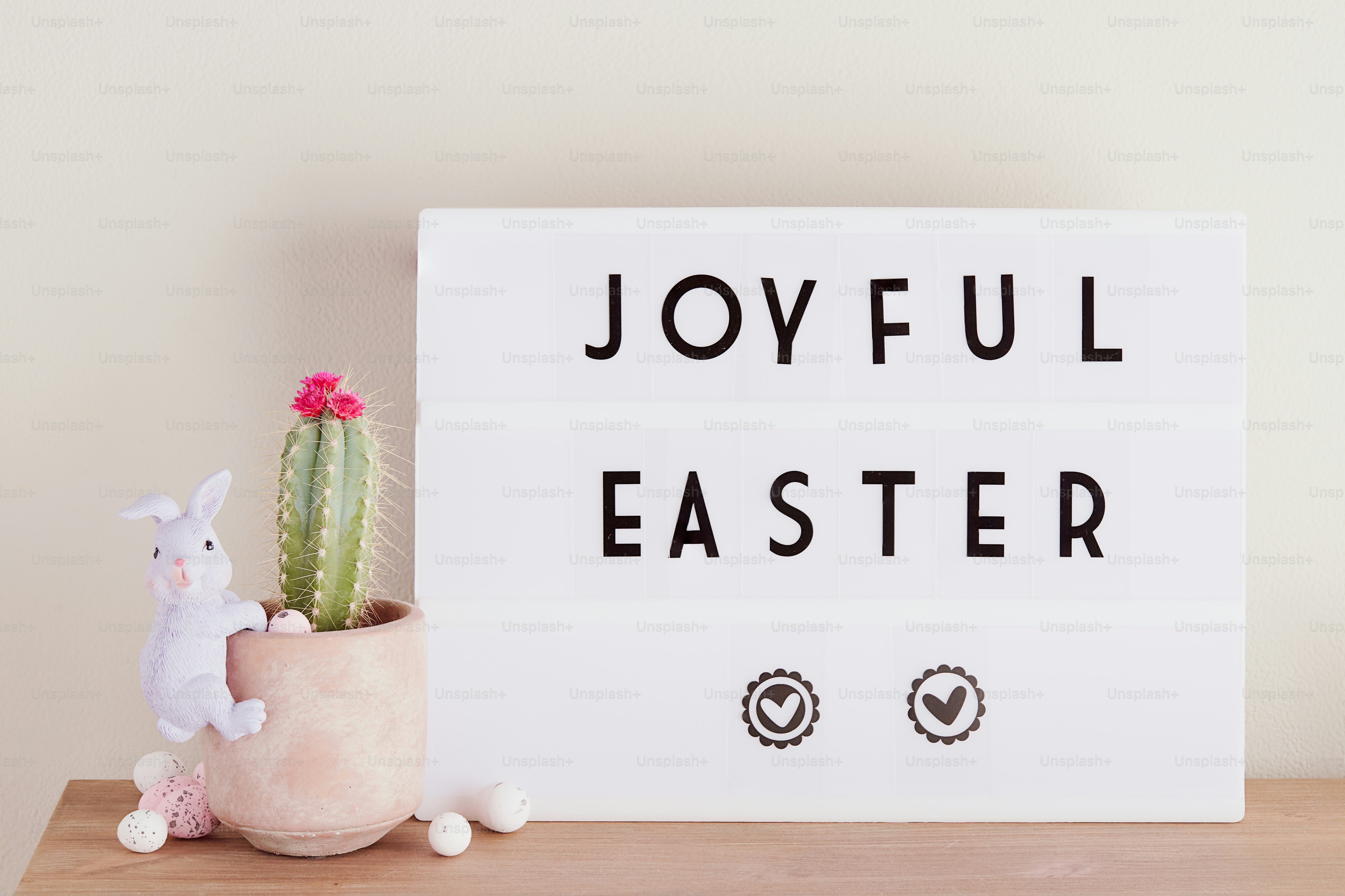 Joyful easter message on a light box.