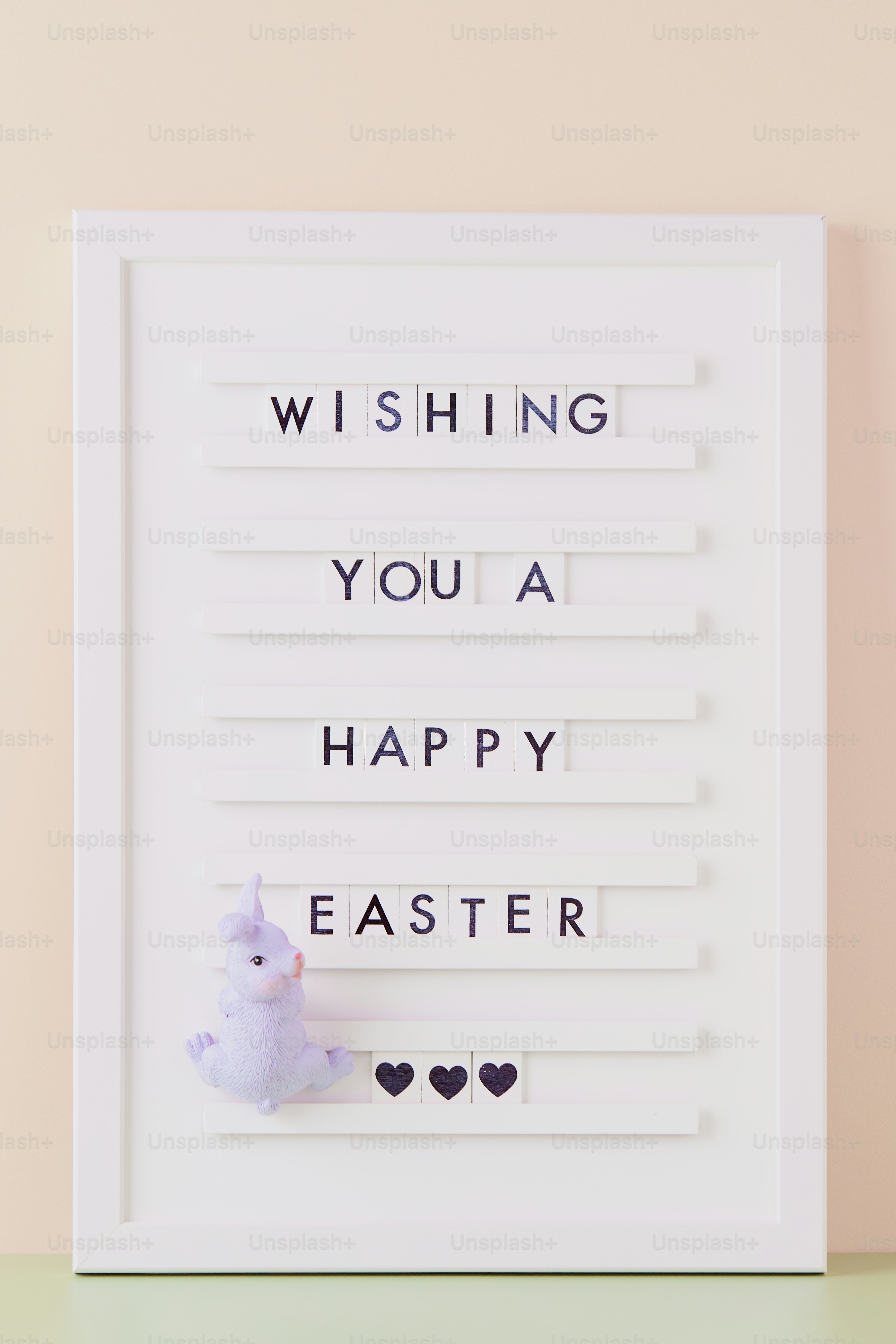 Wishing you a happy easter with unicorn and hearts