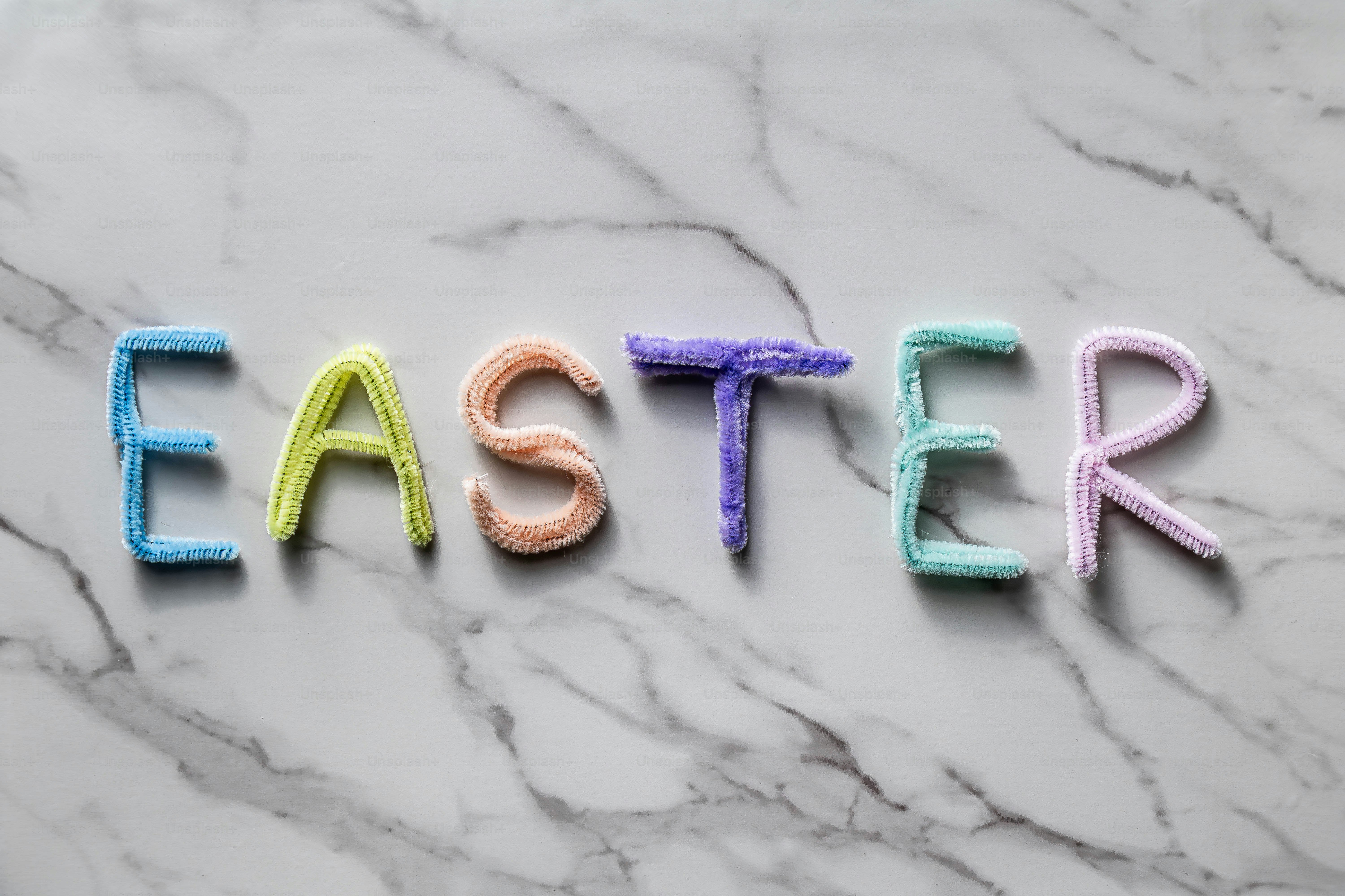 Golden letters spell out he is risen on marble. photo – Minimalist ...