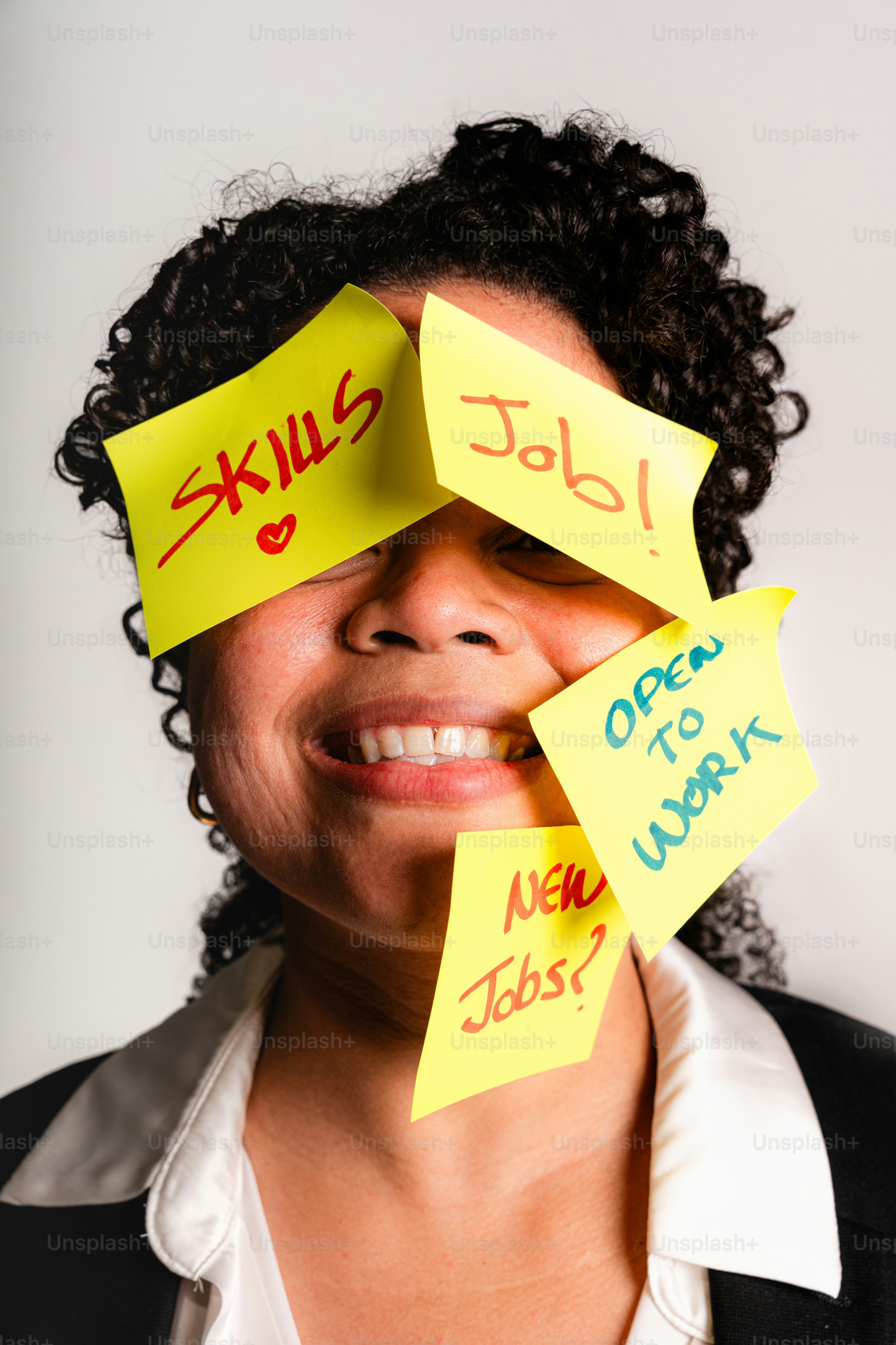 Woman covered in sticky notes about jobs and jobs