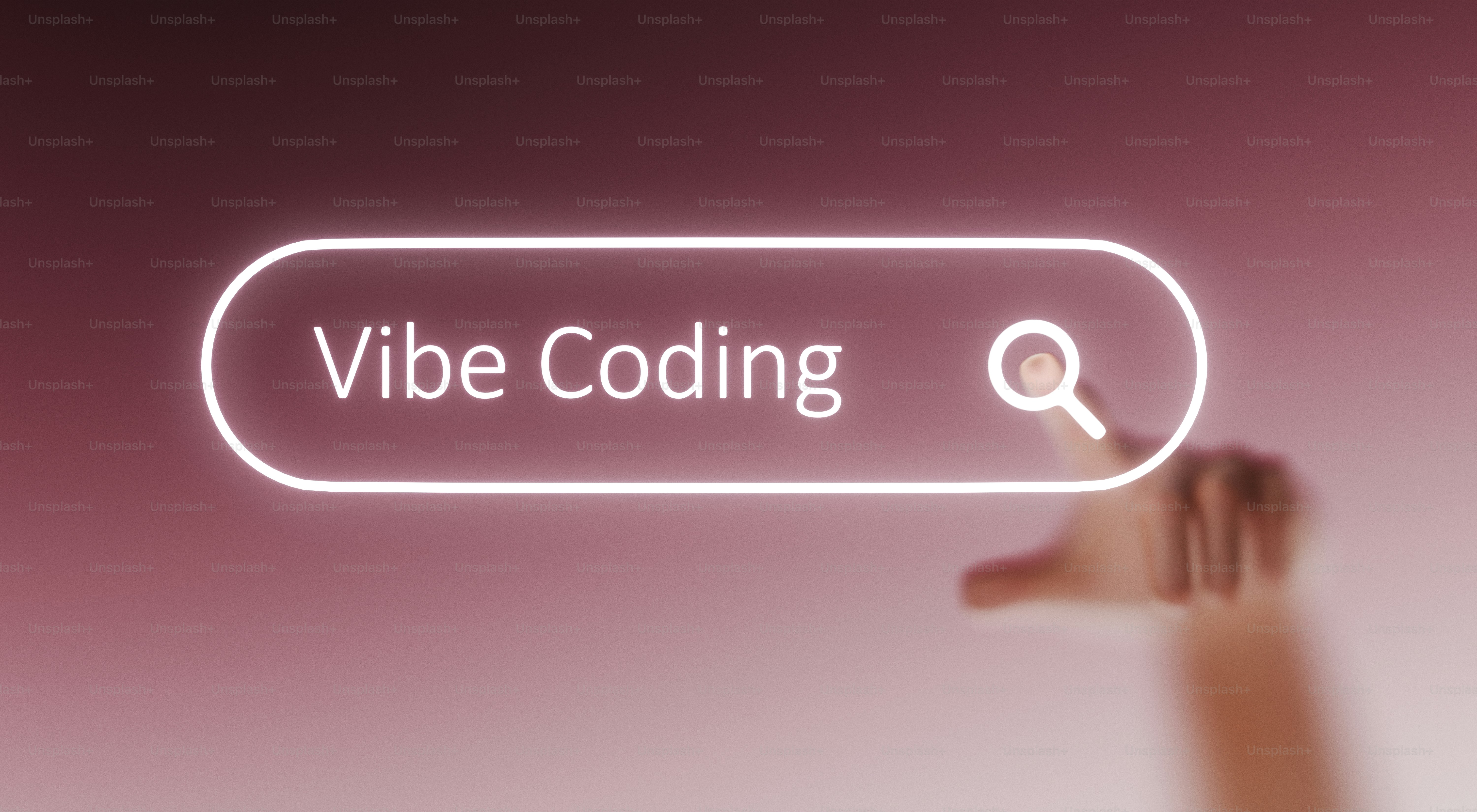 Hand hovering over a search bar with "vibe coding"