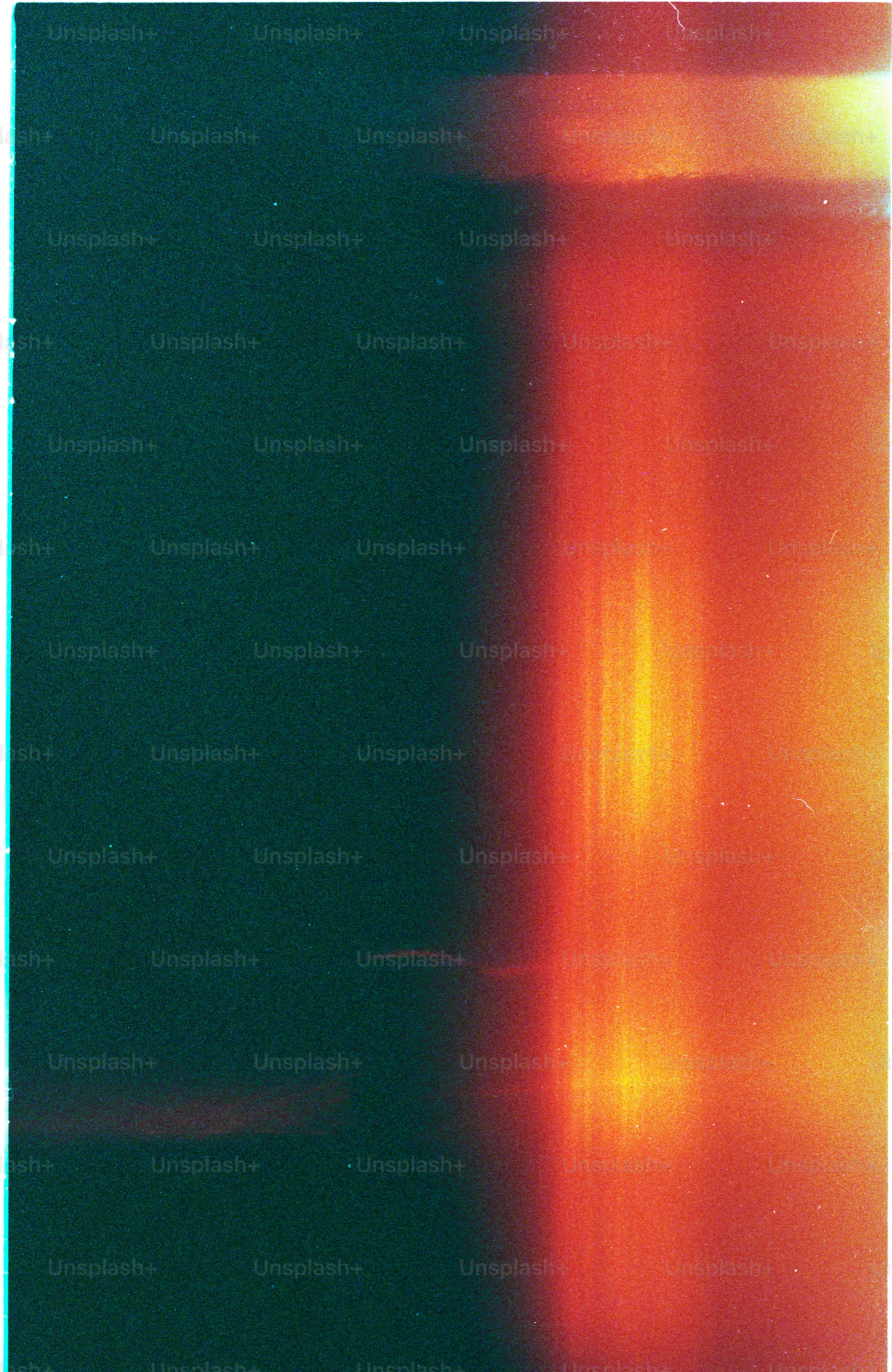 Abstract vertical gradient of dark blue to orange and yellow