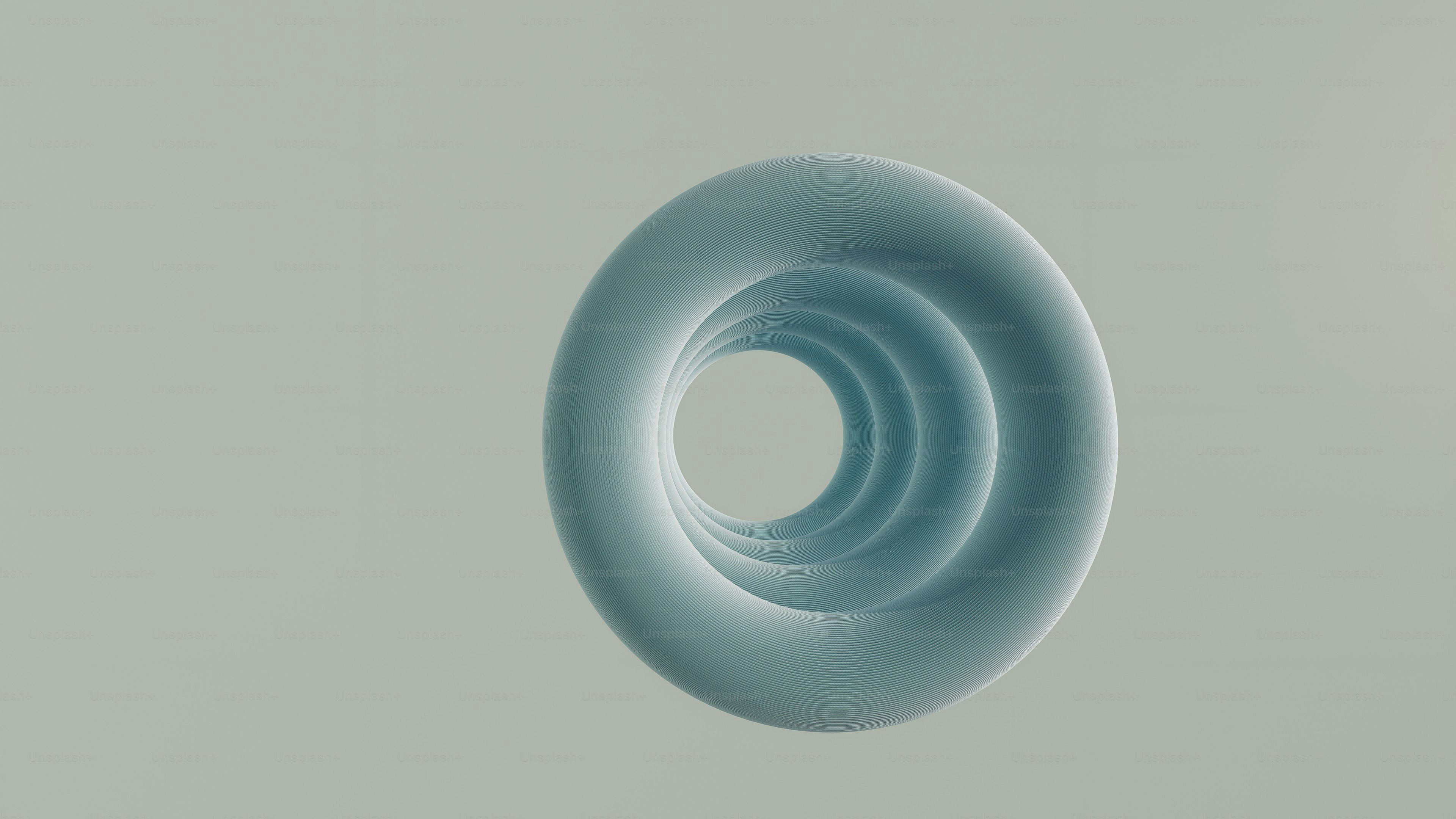 A light blue torus shape with concentric rings
