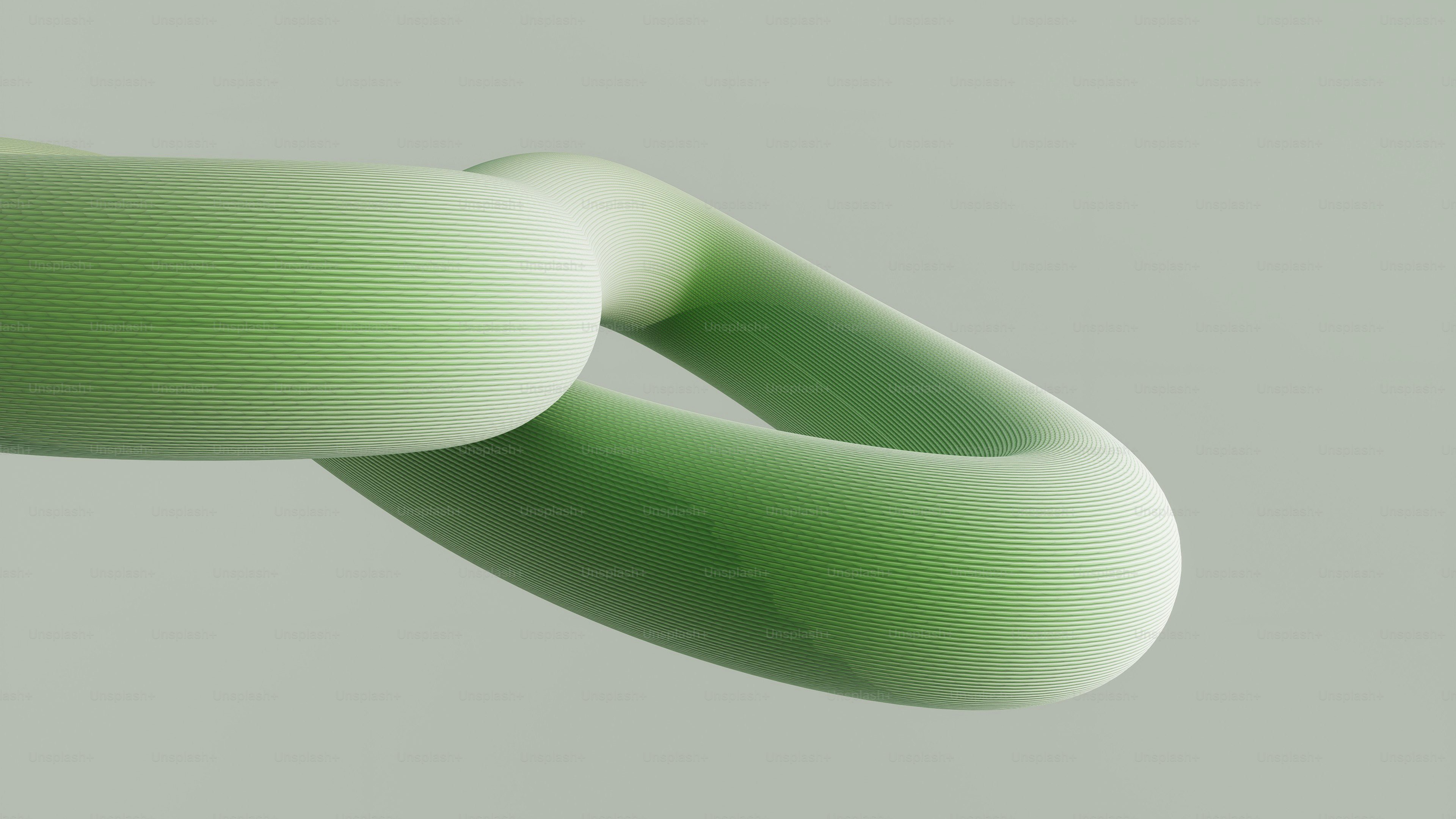 Abstract green torus shape on a grey background