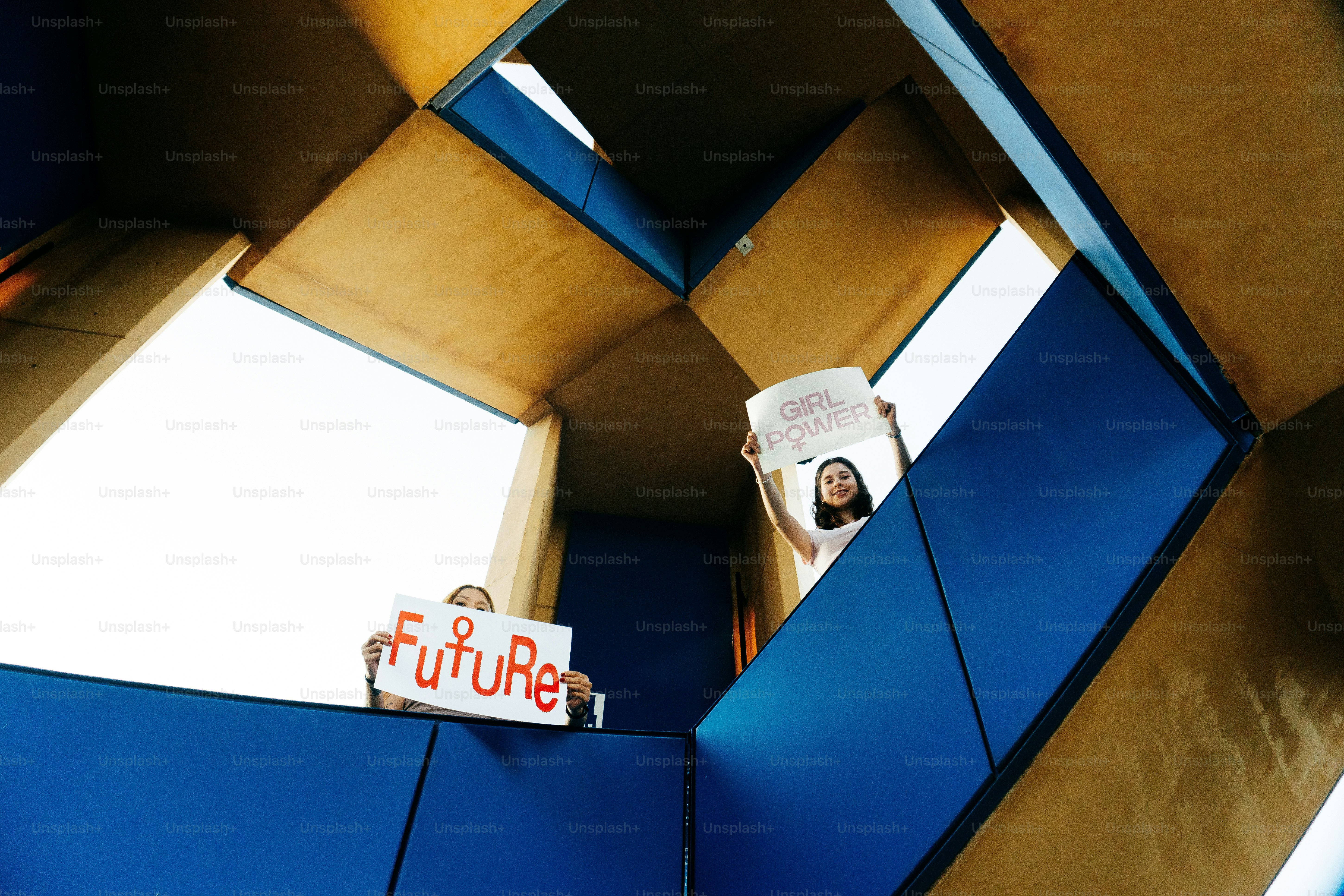 People holding signs with the word "future"