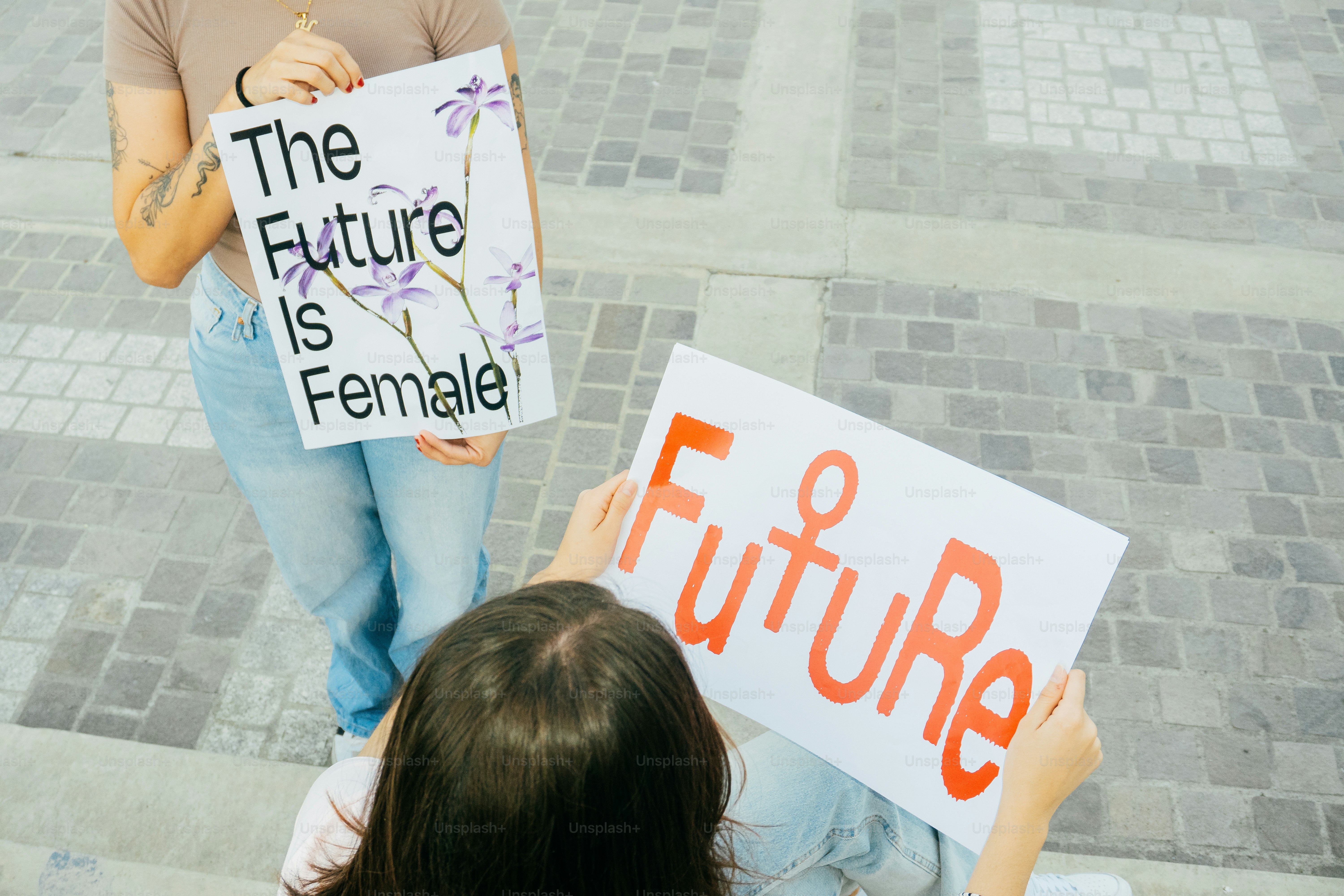 Two women hold signs for women's rights and girl power. photo – Girl ...