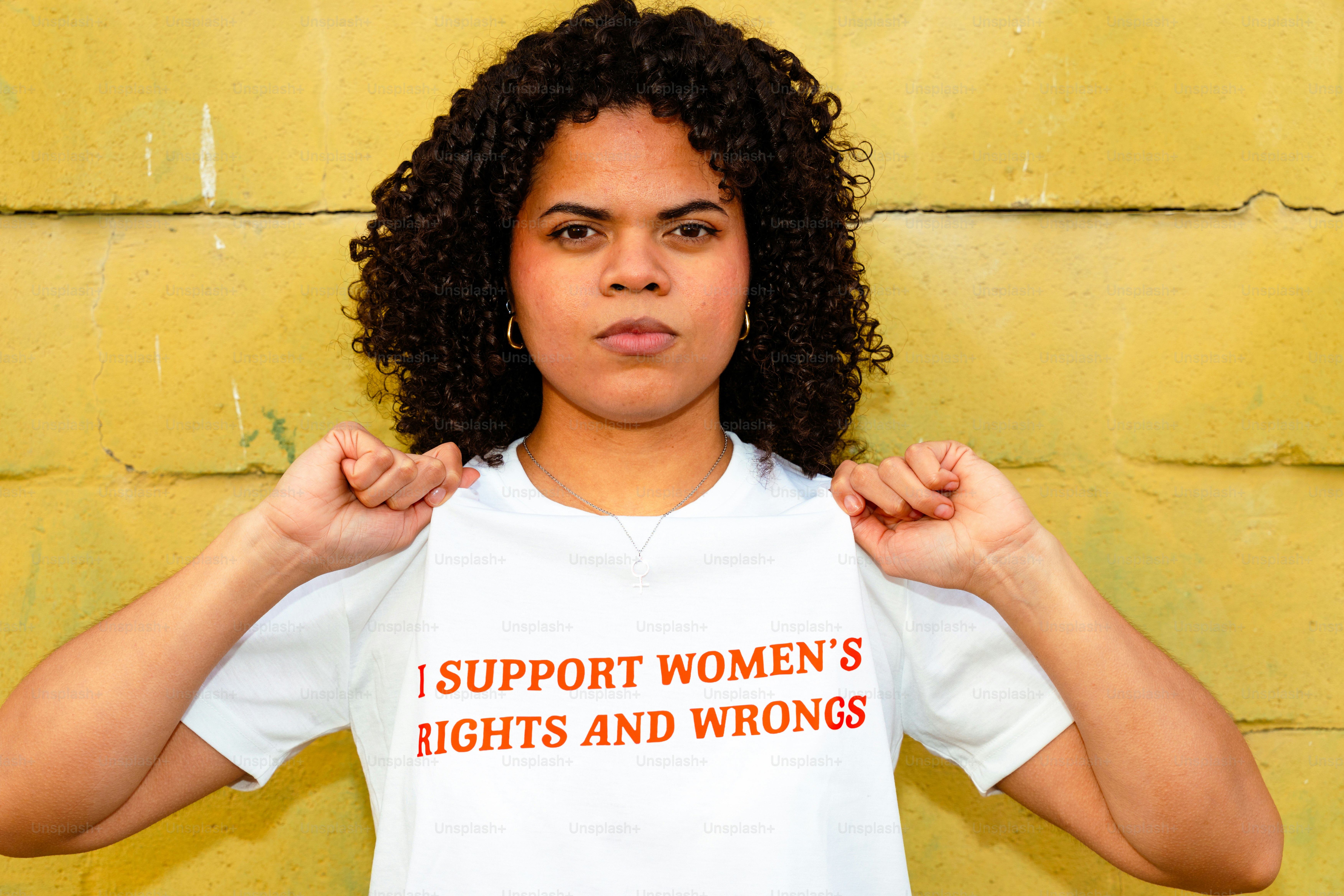 Woman holding signs for women's rights photo – Protest Image on Unsplash