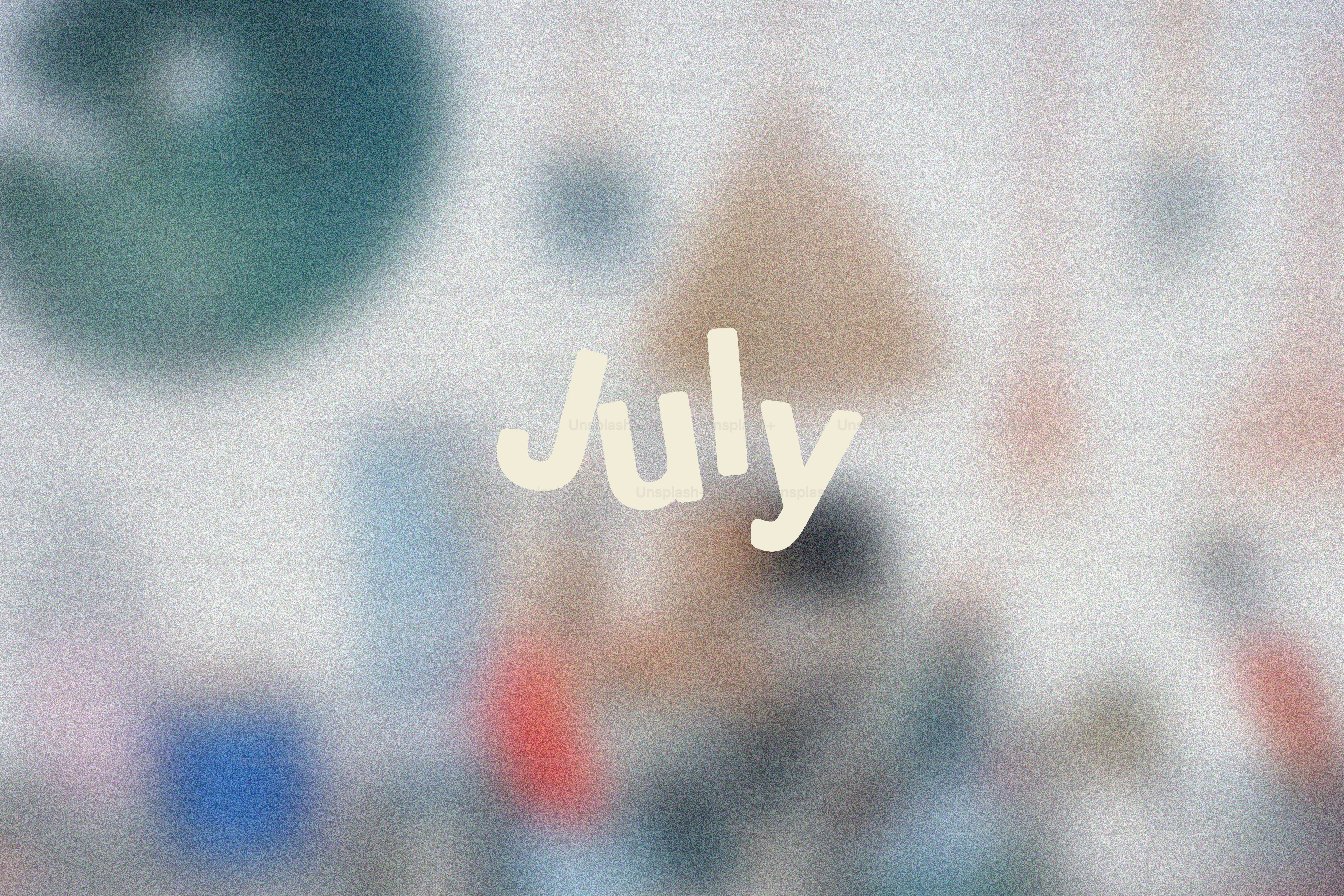 La palabra julio escrita en color crema claro.