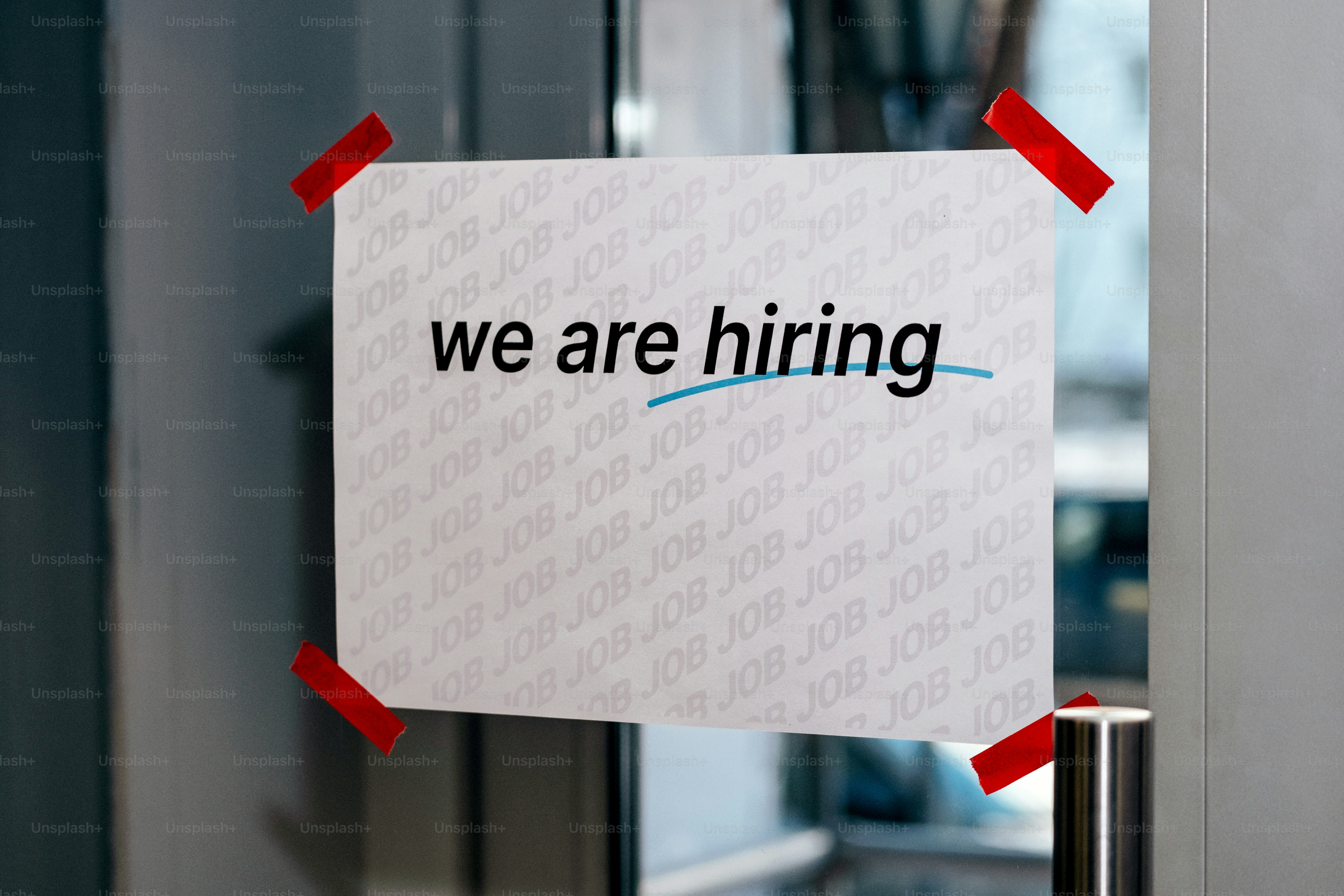 We are hiring sign on a whiteboard. photo – Business Image on Unsplash