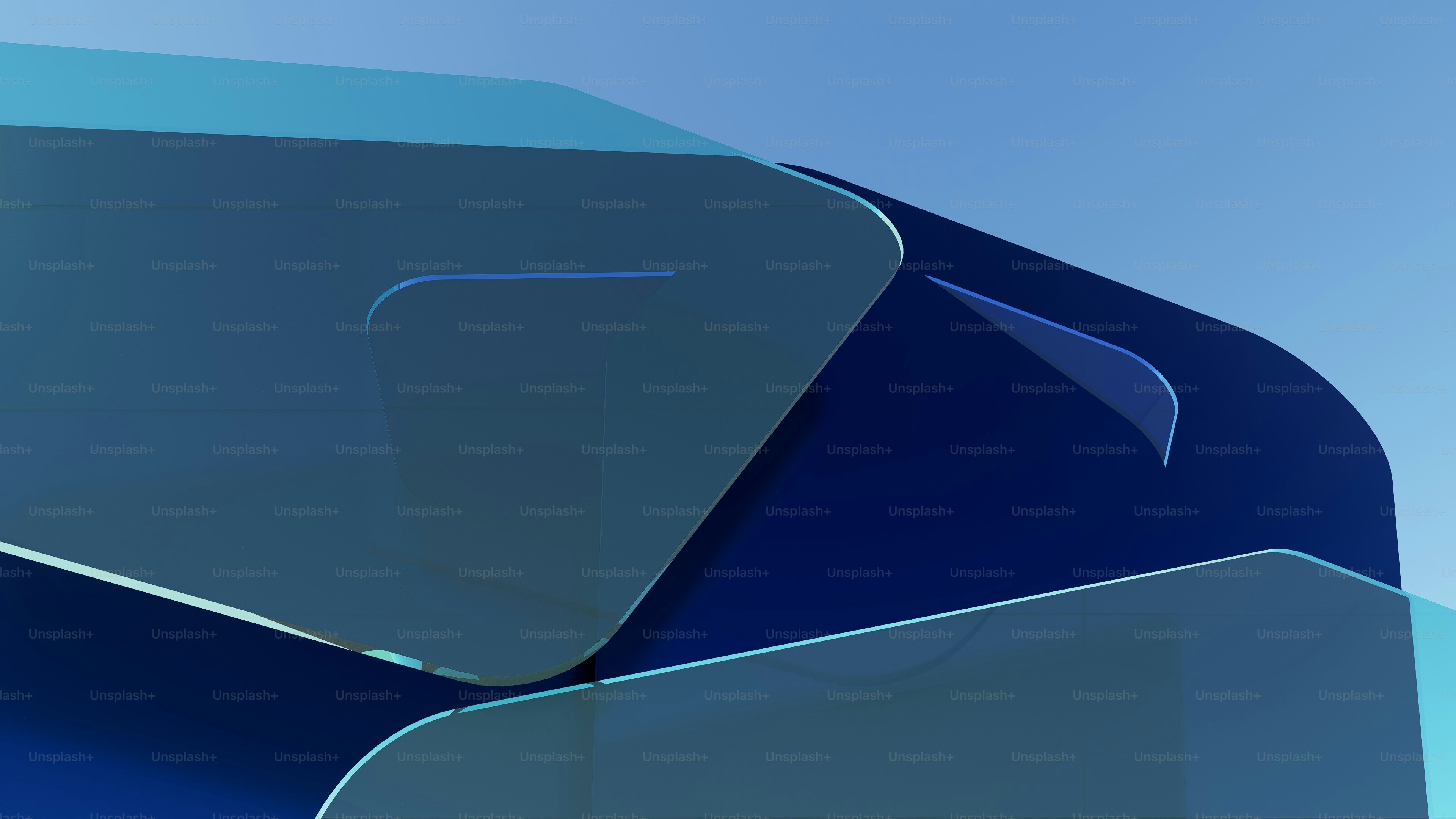 Abstract blue shapes against a clear sky