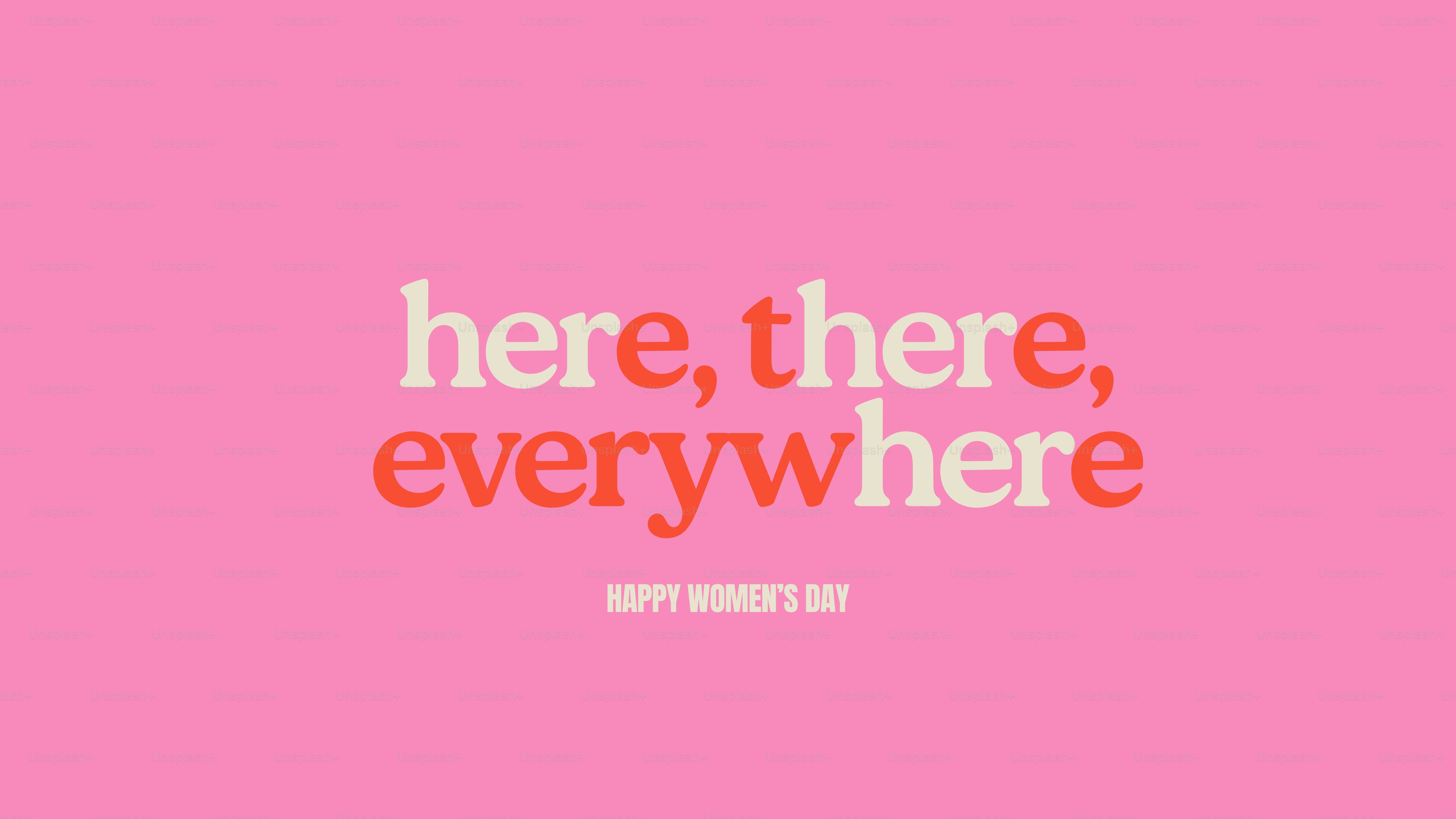 Happy women's day text on pink background