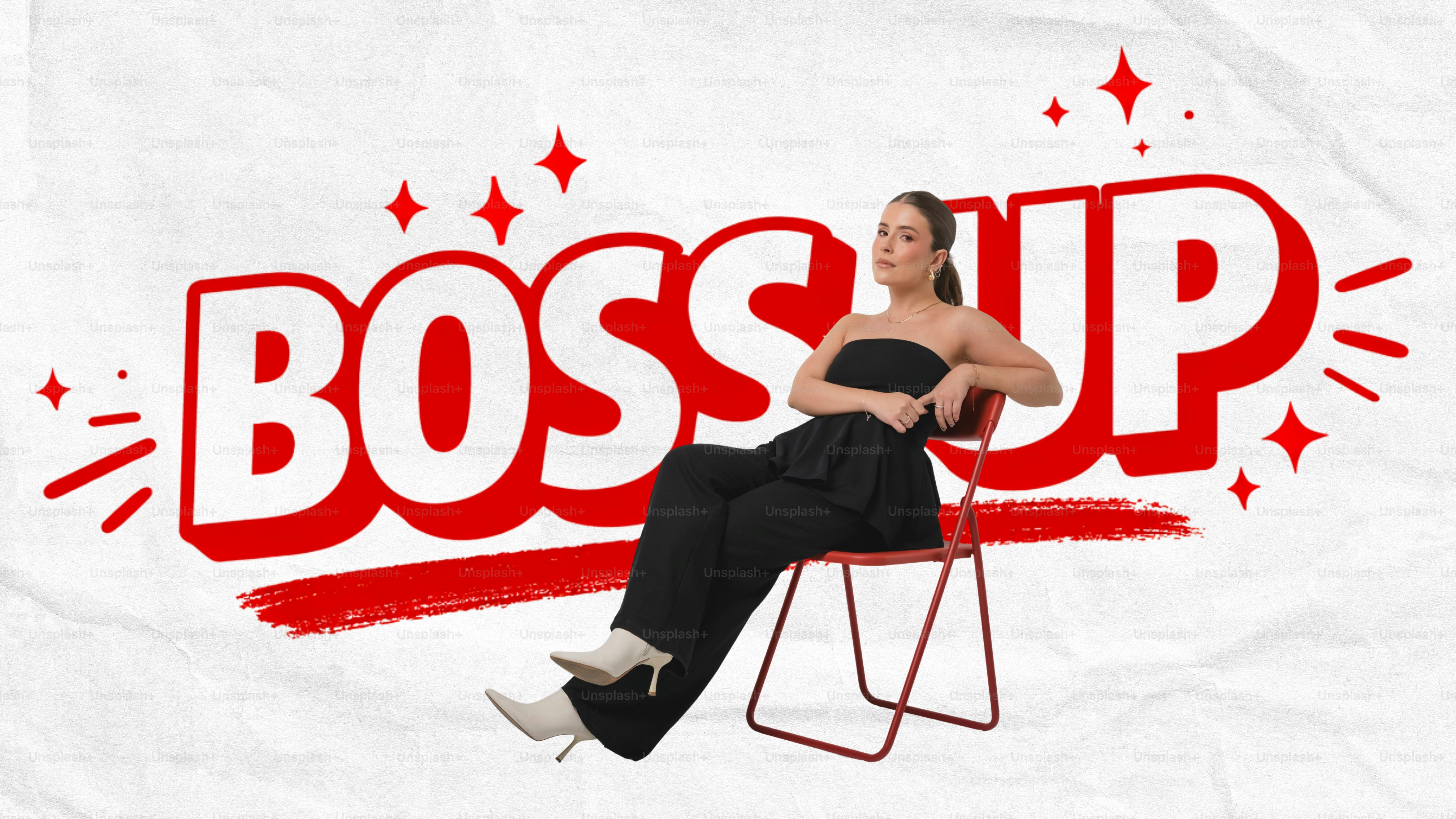 Woman in black sitting in chair with "boss up" text.