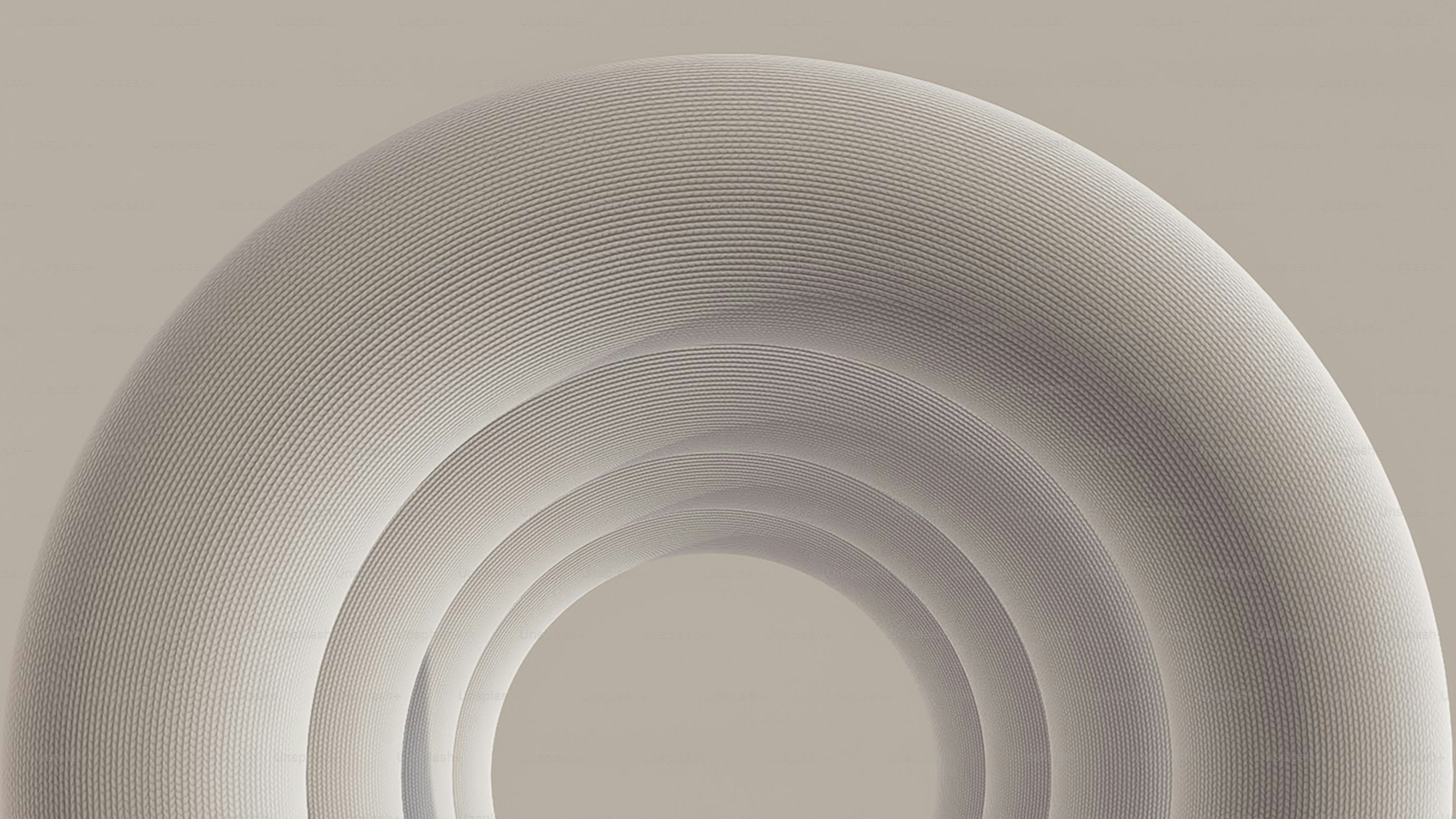 Abstract smooth grey rings receding into the distance