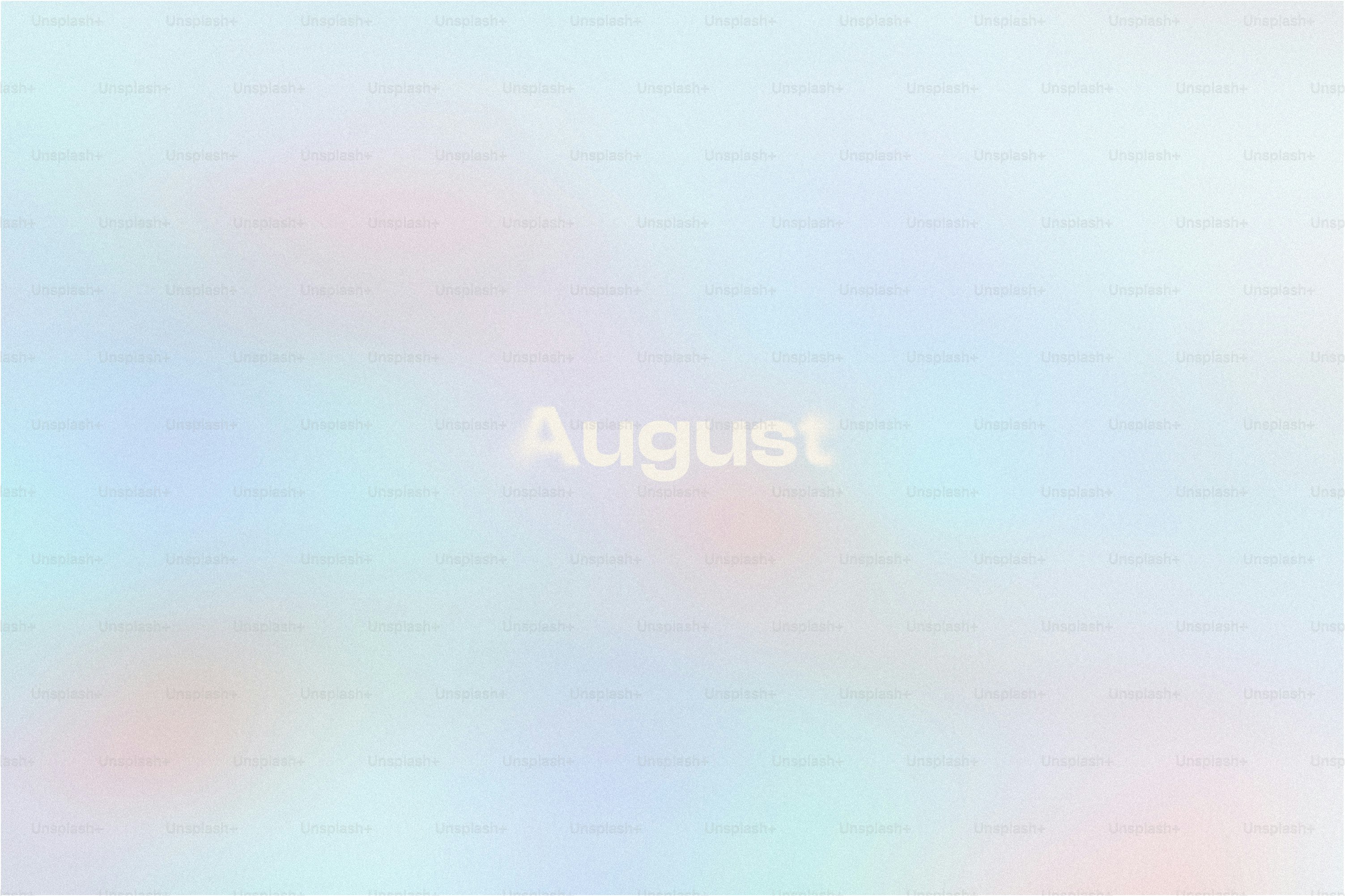 Soft pastel background with the word august
