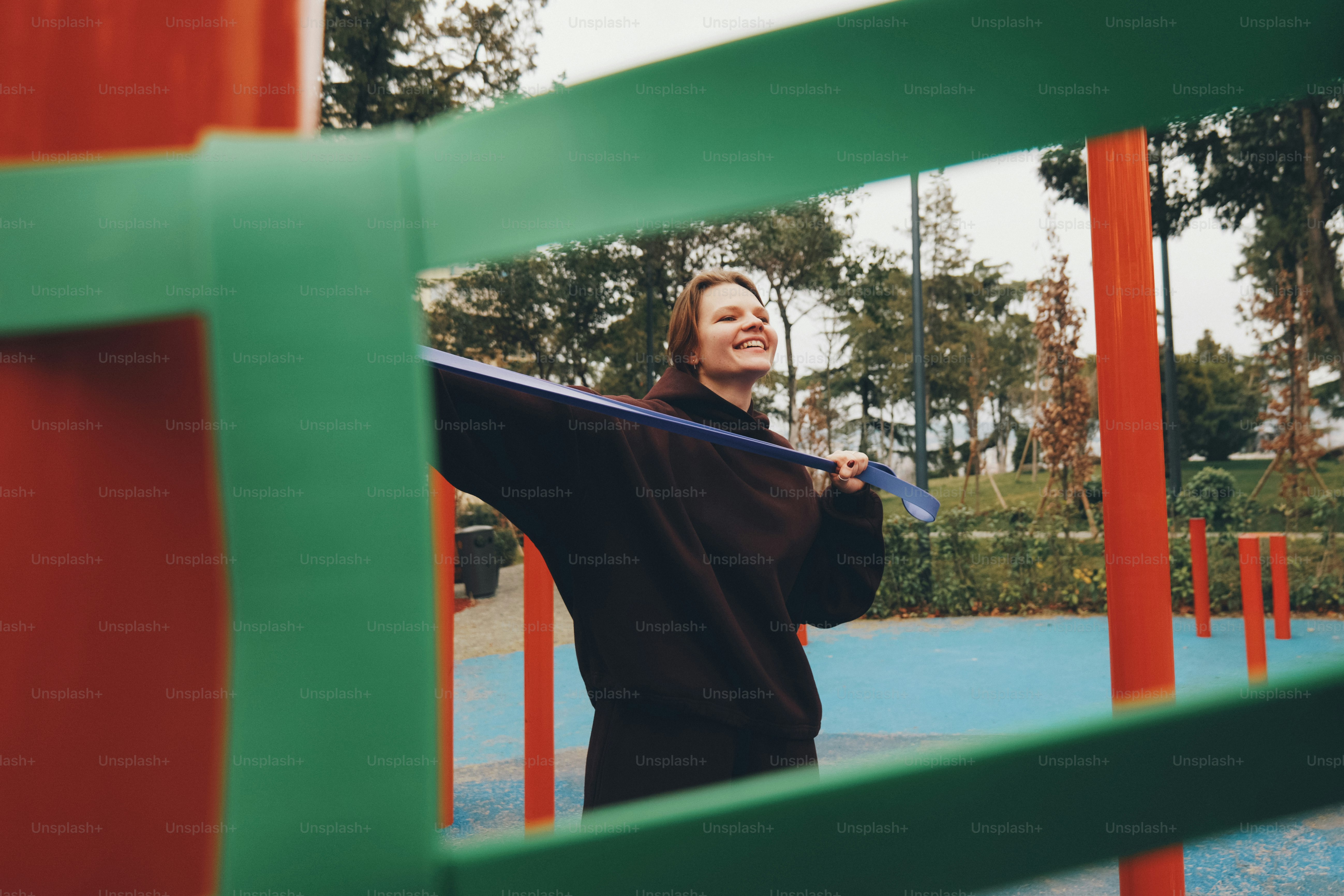 Woman exercising with a resistance band outdoors