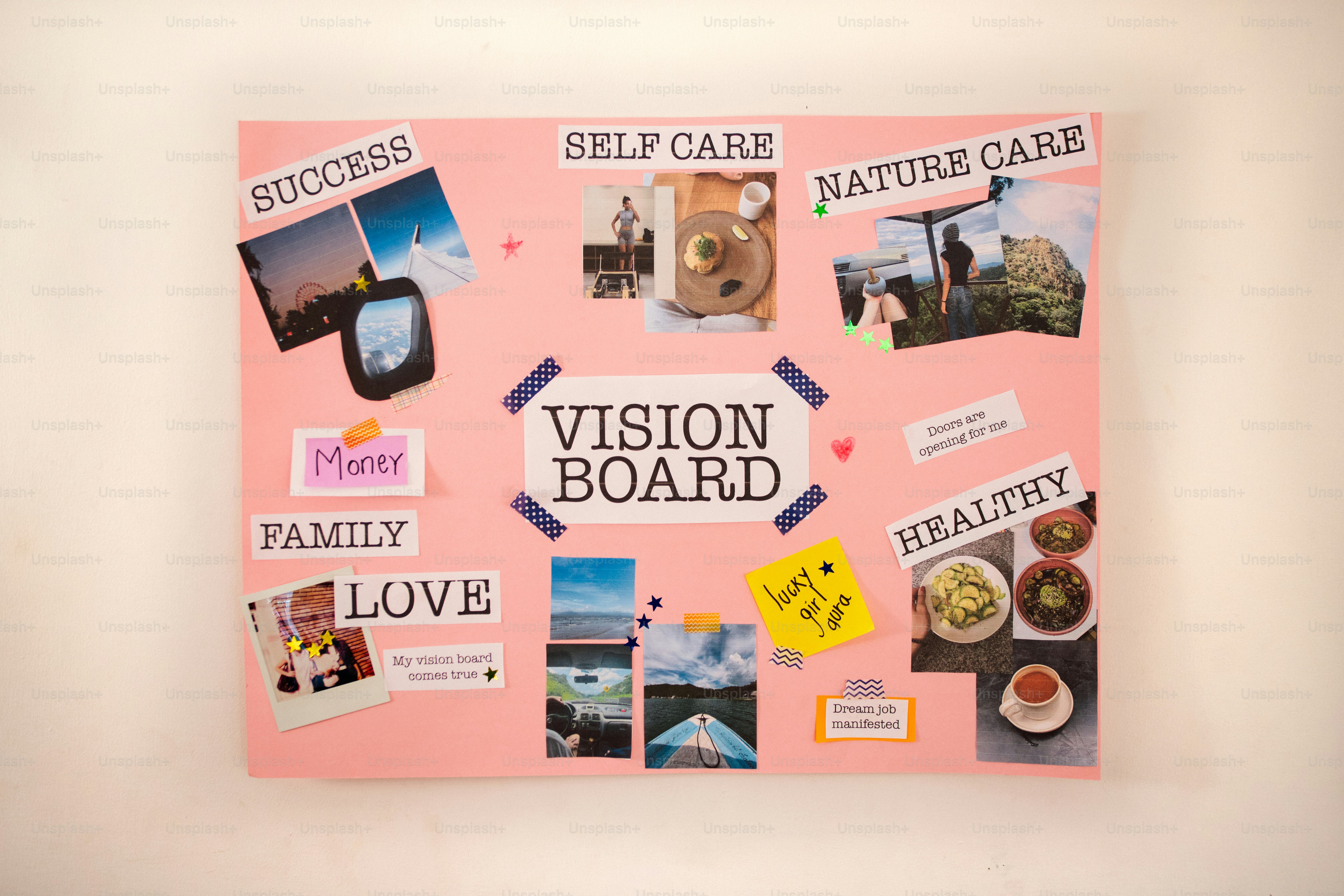 Person creating a vision board with various images and words. photo ...