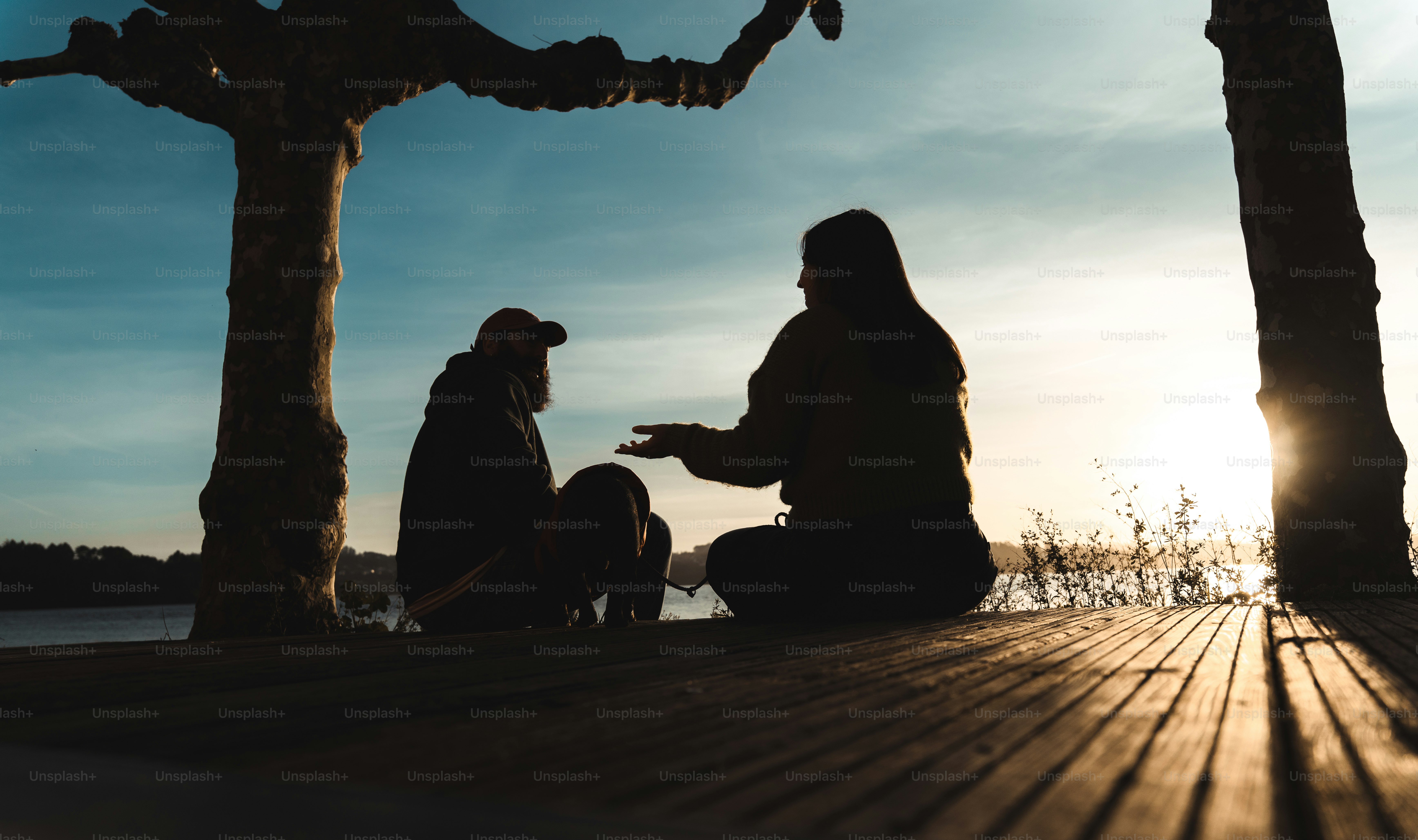 Two shadows cast on an orange wall photo – People Image on Unsplash
