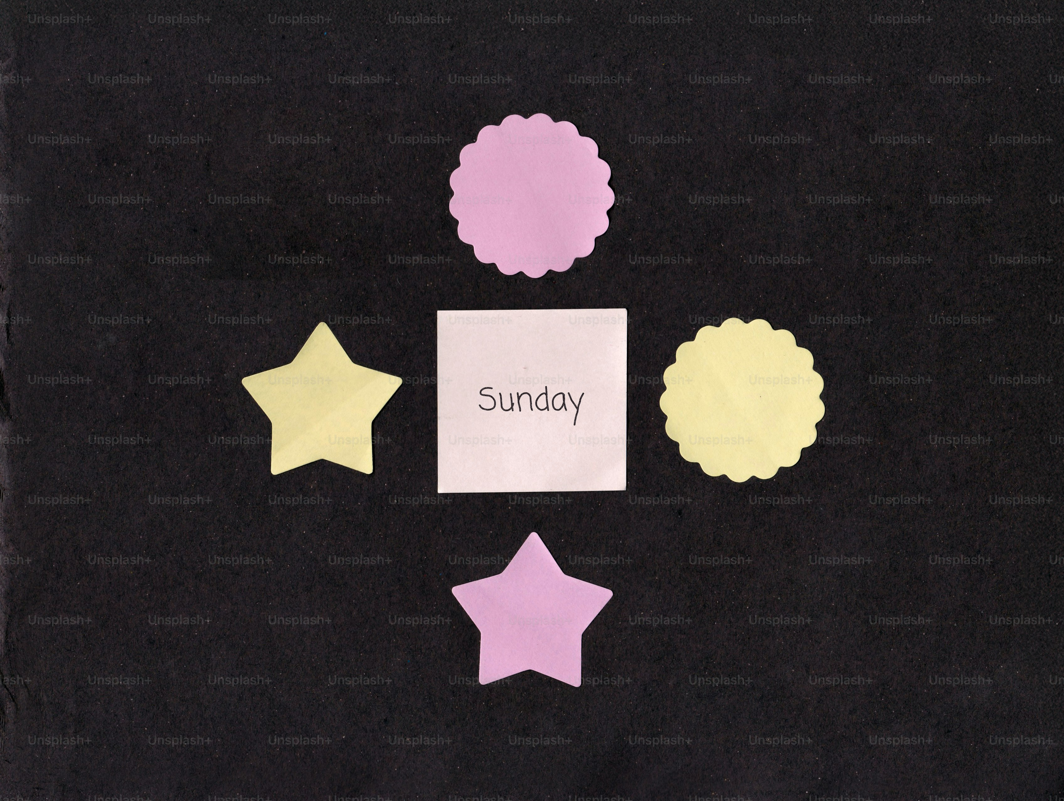 Square with 'sunday' surrounded by stars and circles.