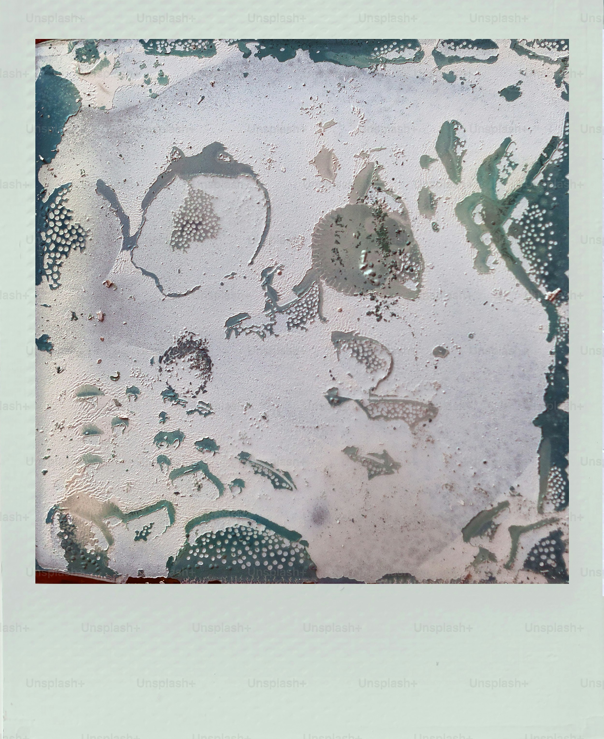 Abstract pattern of water stains on paper.