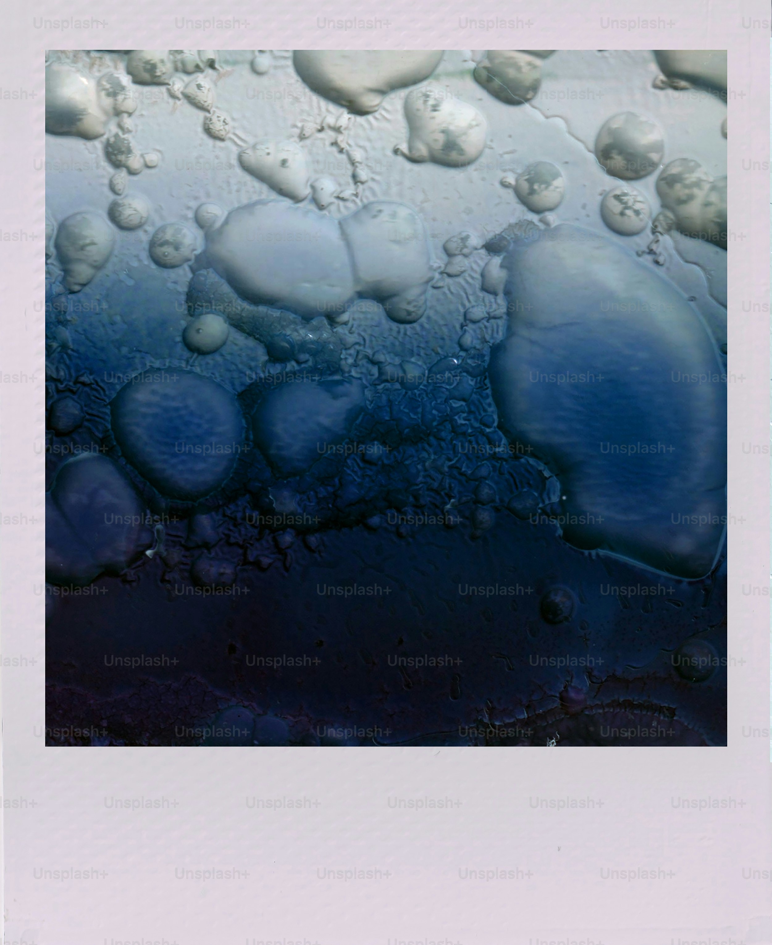 Abstract blue and white bubbly texture